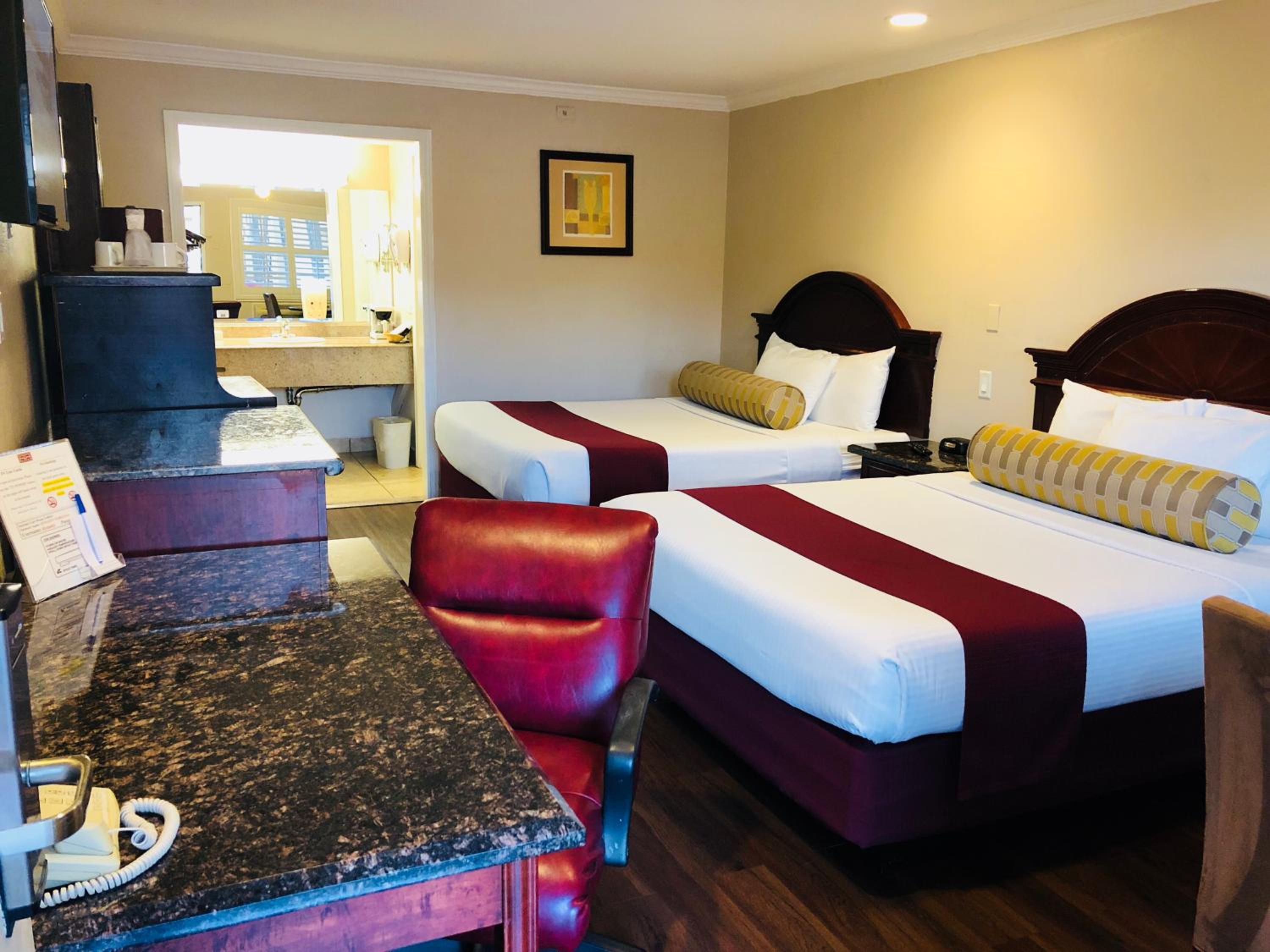 Queen Room with Two Queen Beds - Photo 1