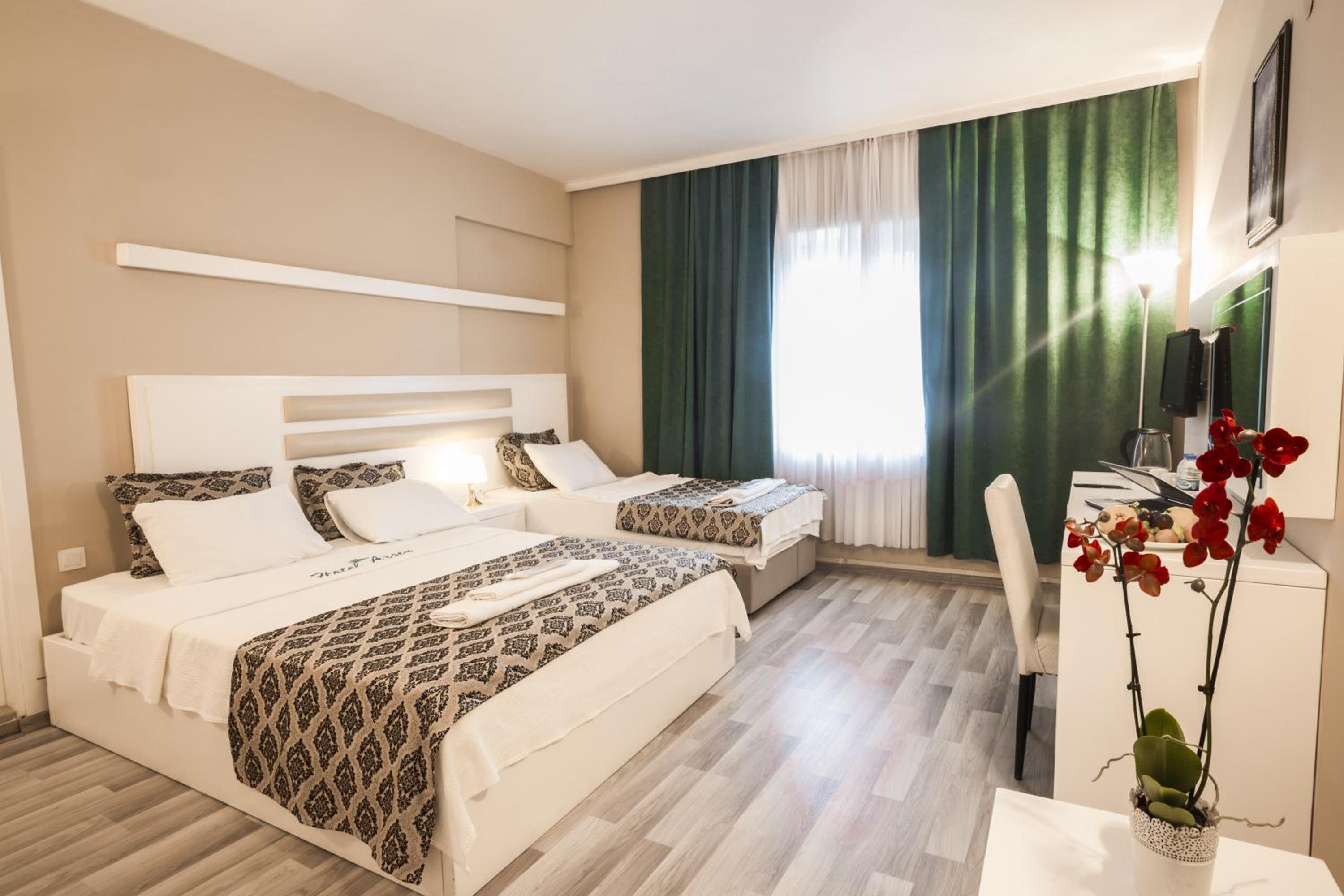 Standard Twin Room - Photo 4