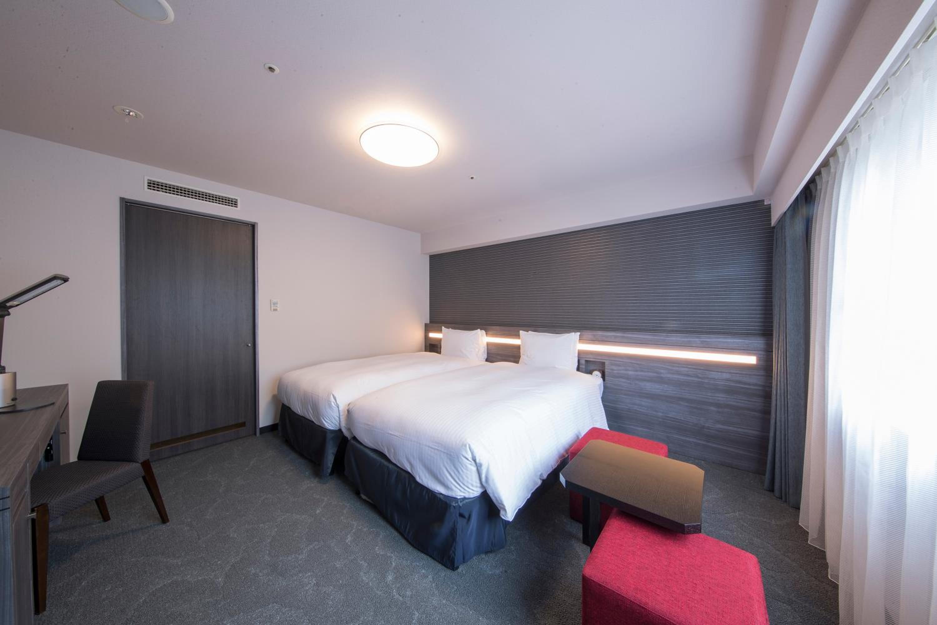 Twin Room (2 Adult) - Non-Smoking photo 1