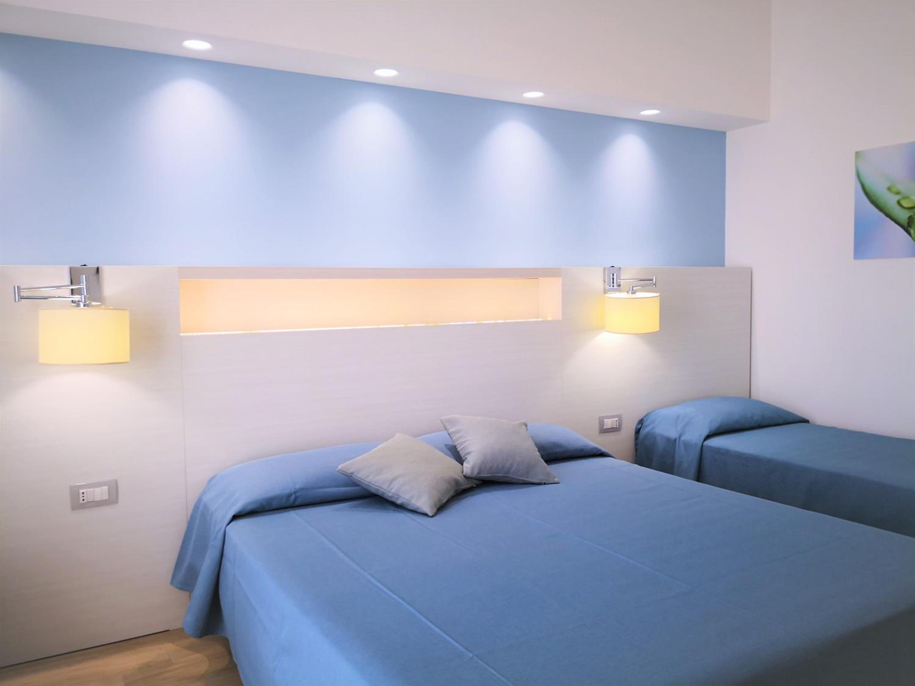 Deluxe Triple Room with Balcony photo 2