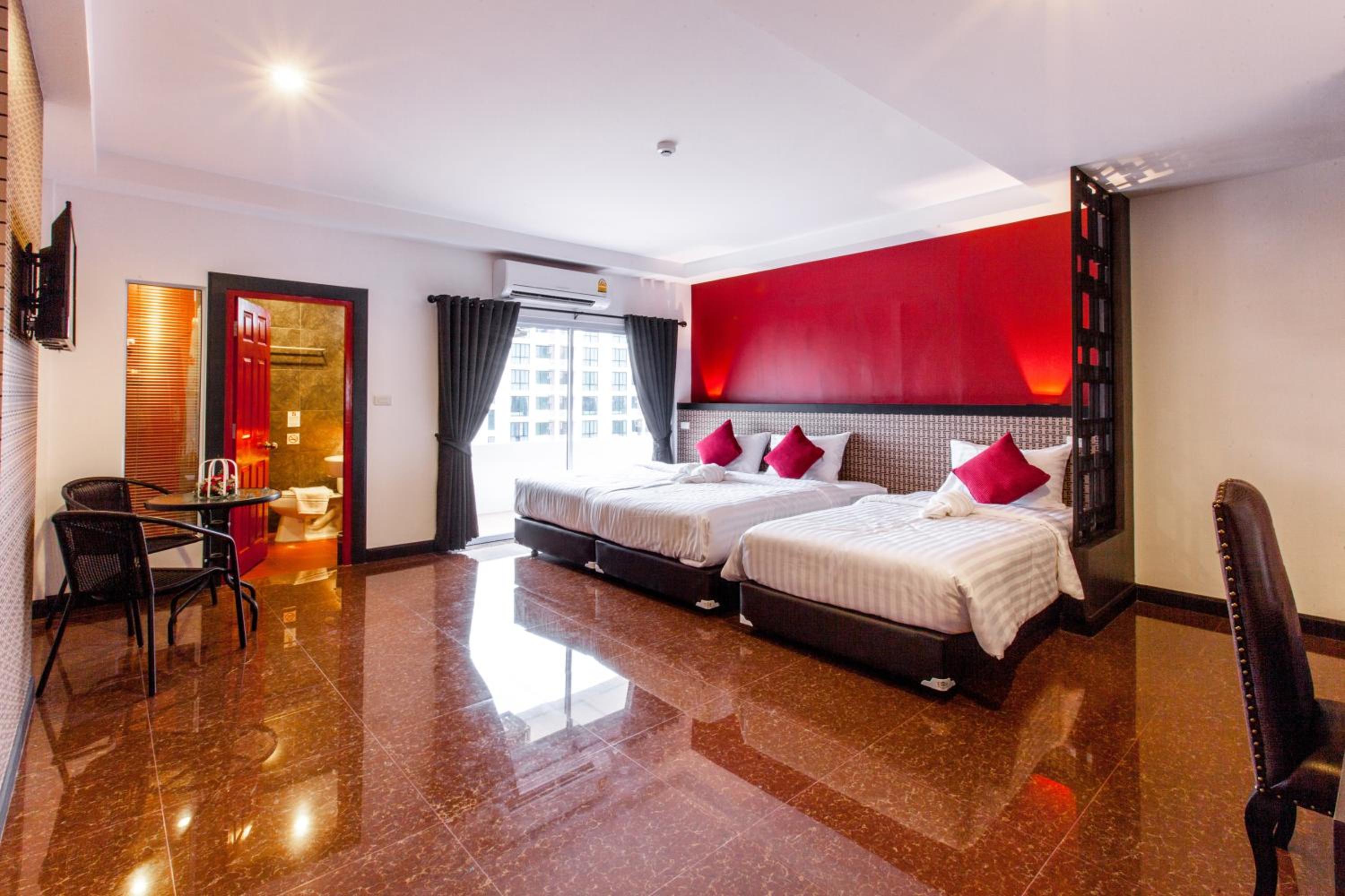Deluxe Triple Room - Photo 1