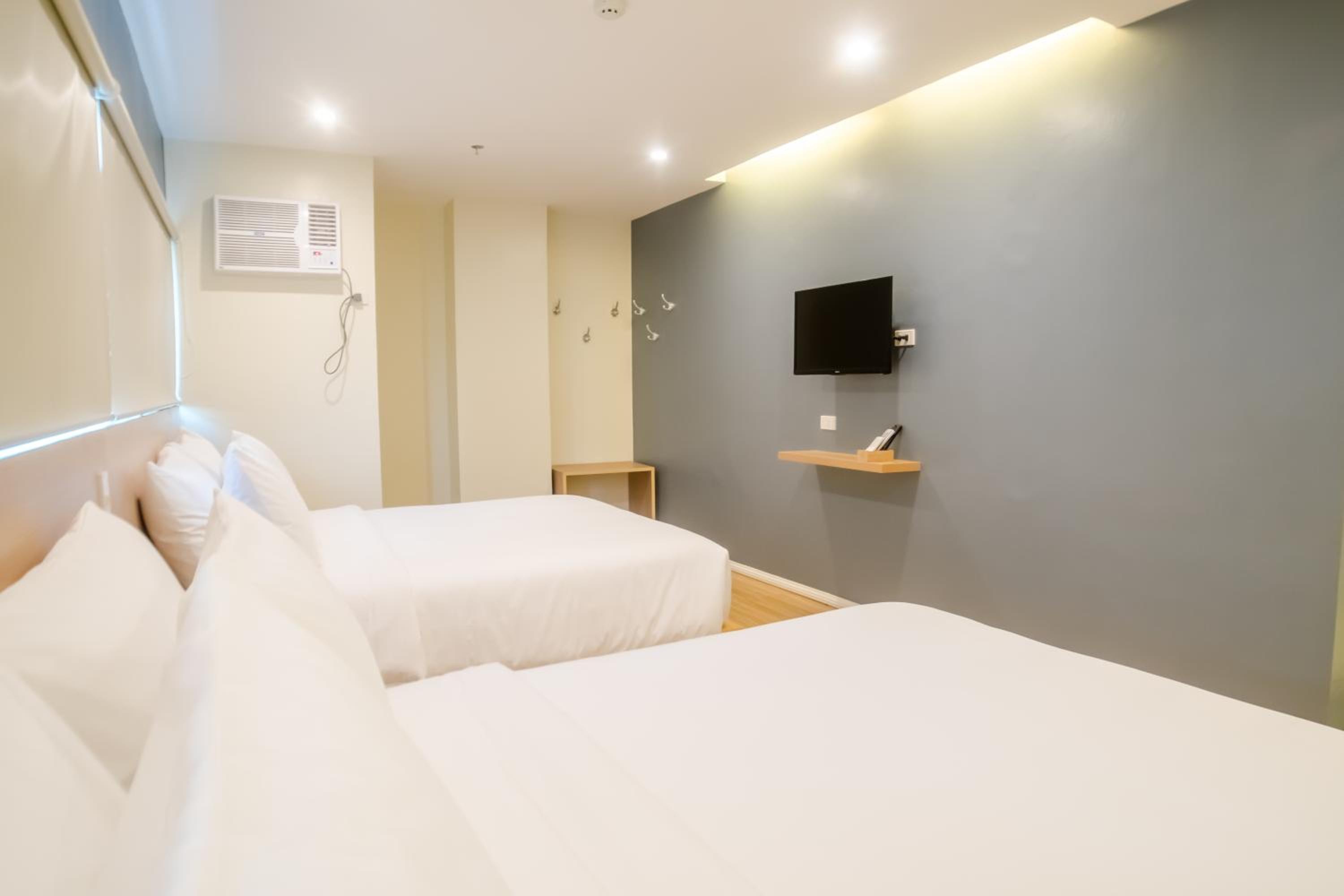 Deluxe Queen Room with Two Queen Beds - Photo 2