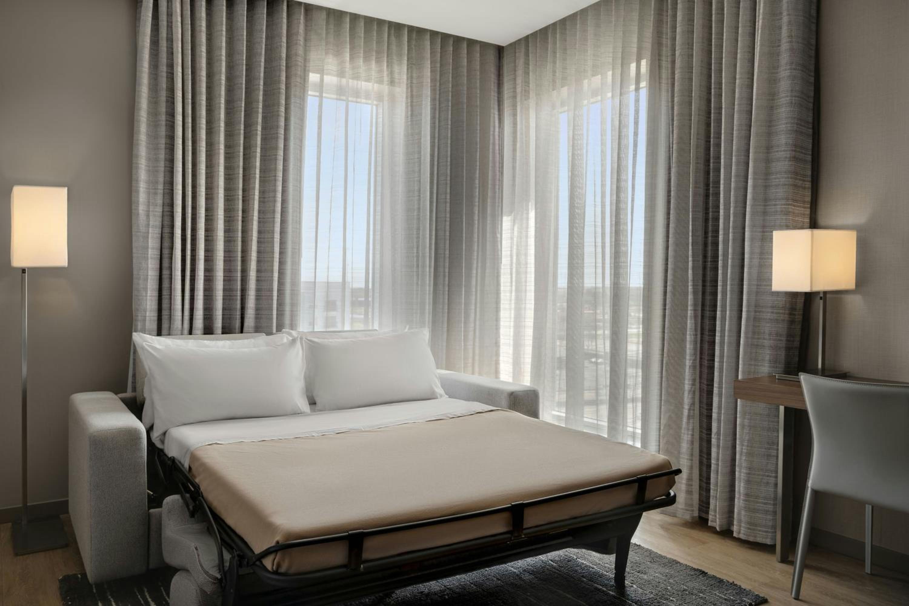 Room with Two King Beds and Sofa Bed - Hearing Accessible