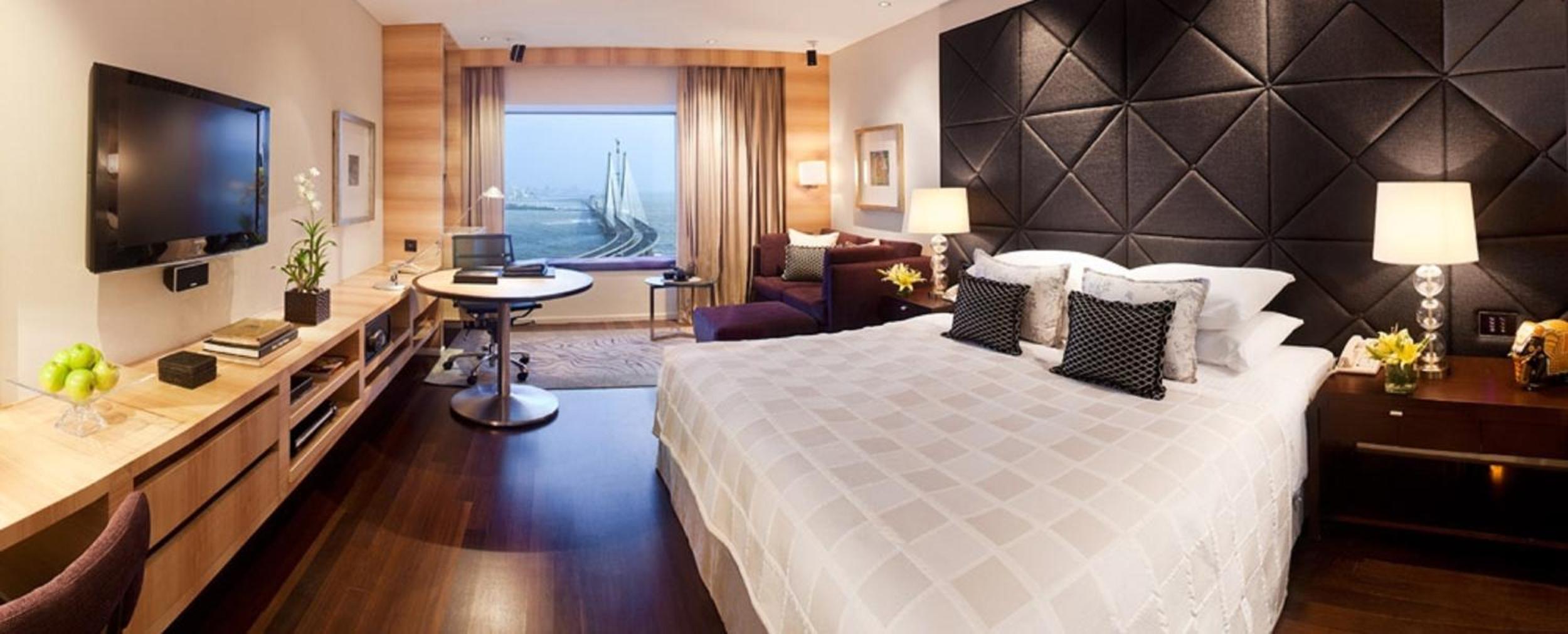 Taj Club Room King Bed – High tea, evening cocktails, butler service, Complimentary 1 way airport transfer Taj Club Room King Bed – High tea, evening cocktails, butler service, Complimentary 1 way airport transfer