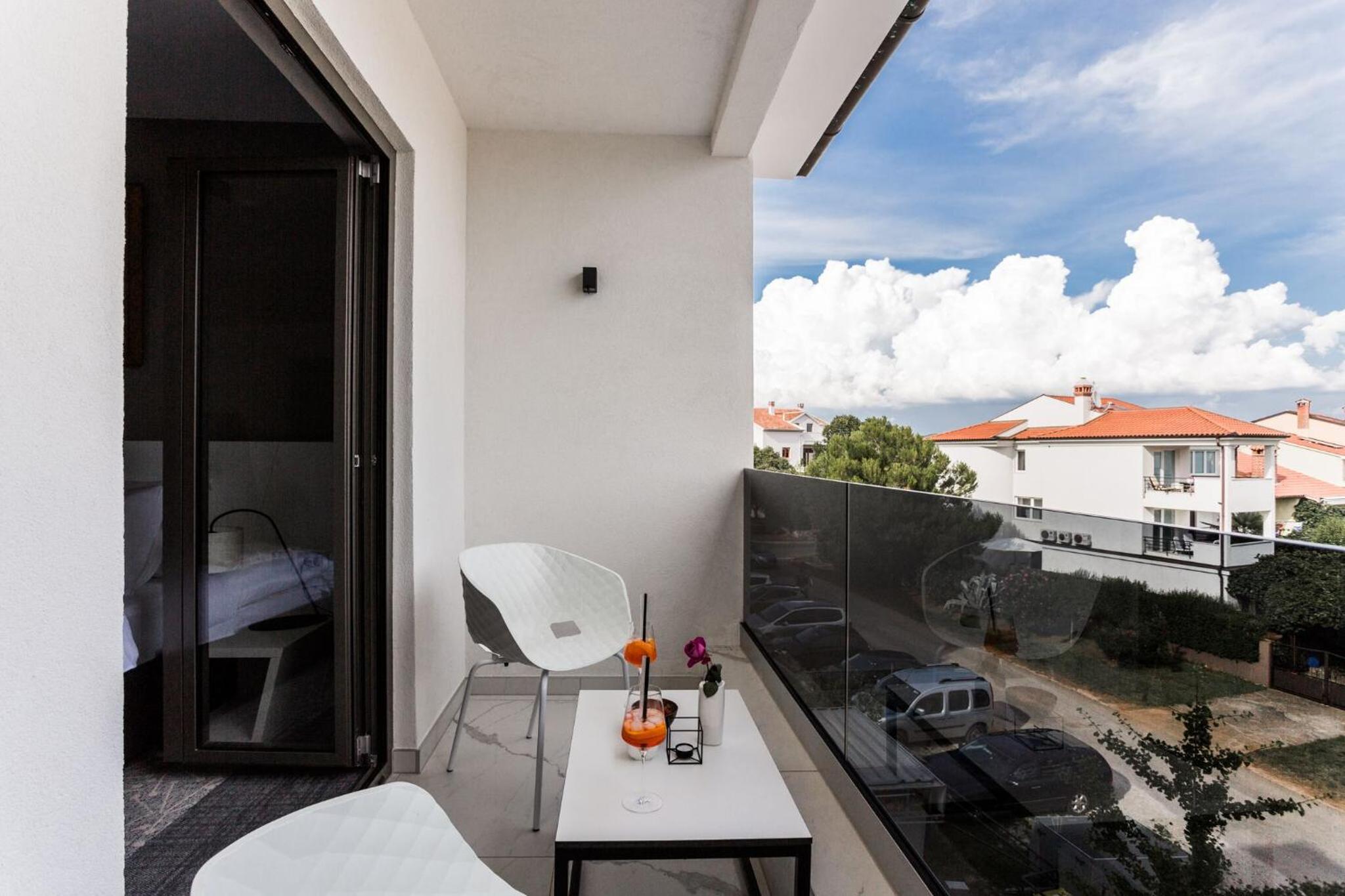 Deluxe Double Room with Balcony - Photo 2