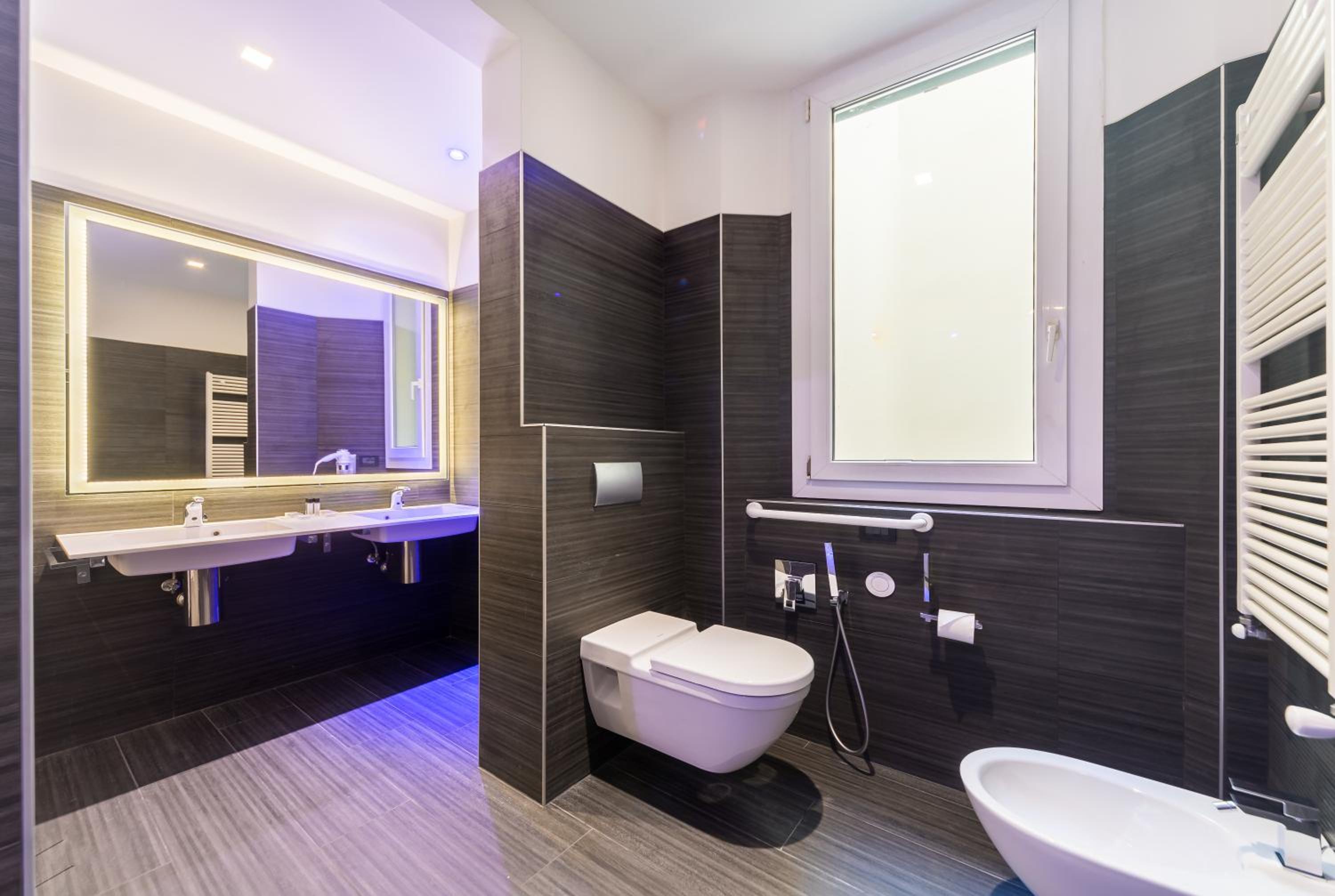 Relax in our stylish and modern bathroom oasis.