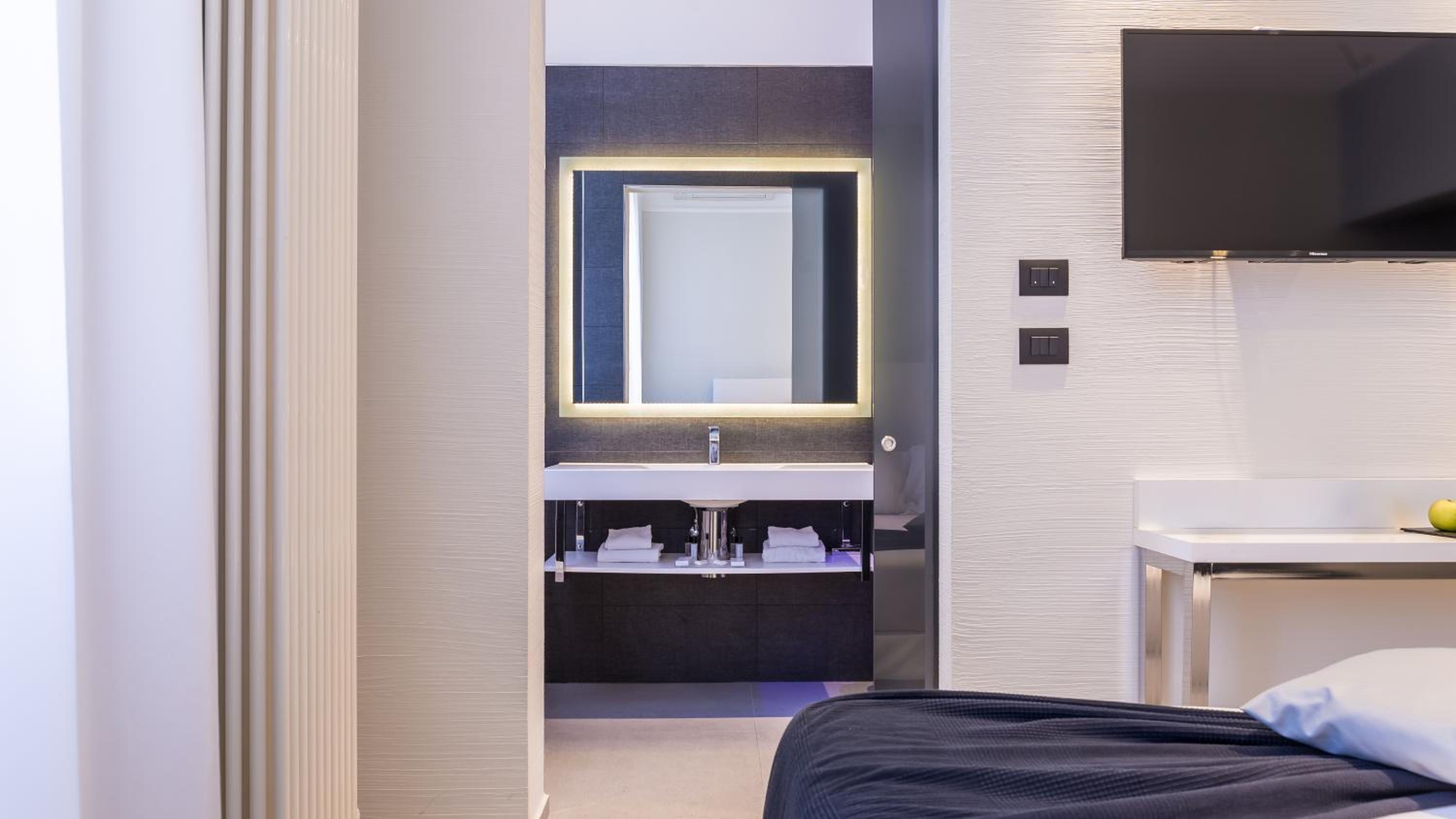 Relax in a sleek and modern bath retreat.