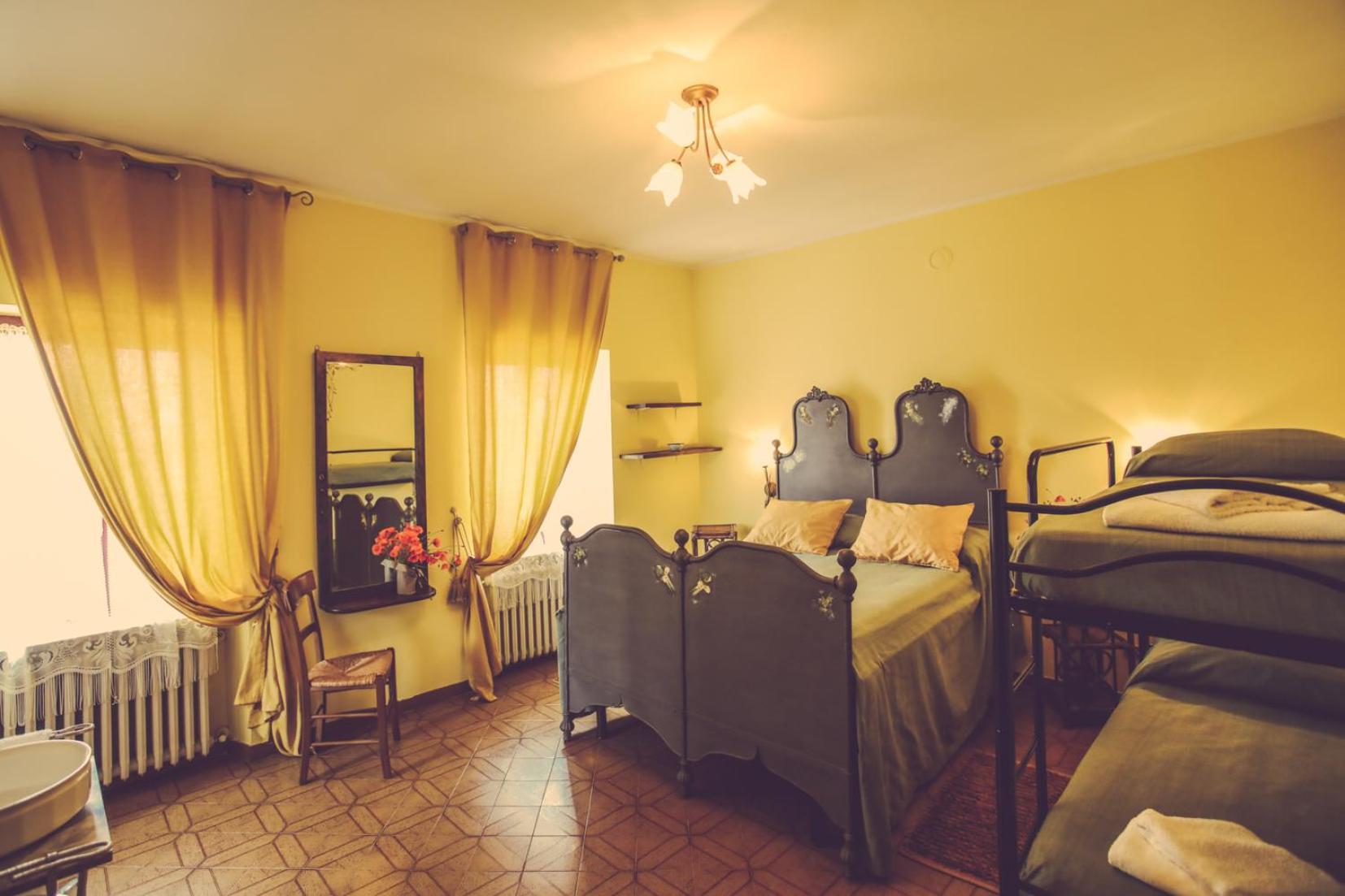 Quadruple Room with Private Bathroom photo 1