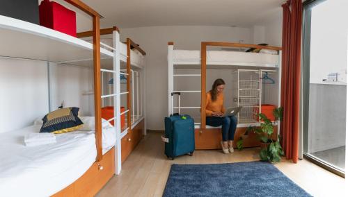 Bed in 8-Bed Dormitory Room with Shared Bathroom photo 2