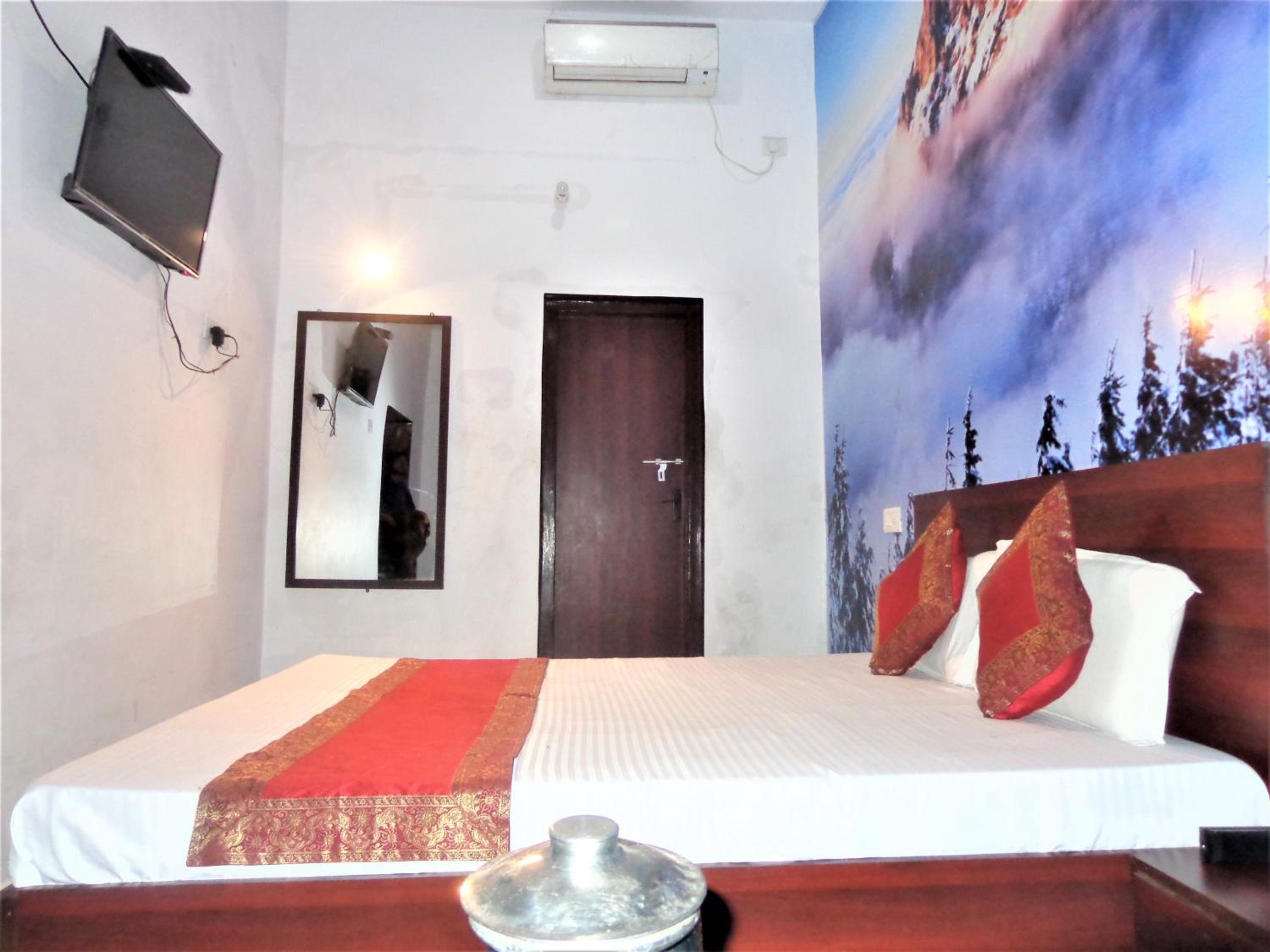 Deluxe Room - Photo 20