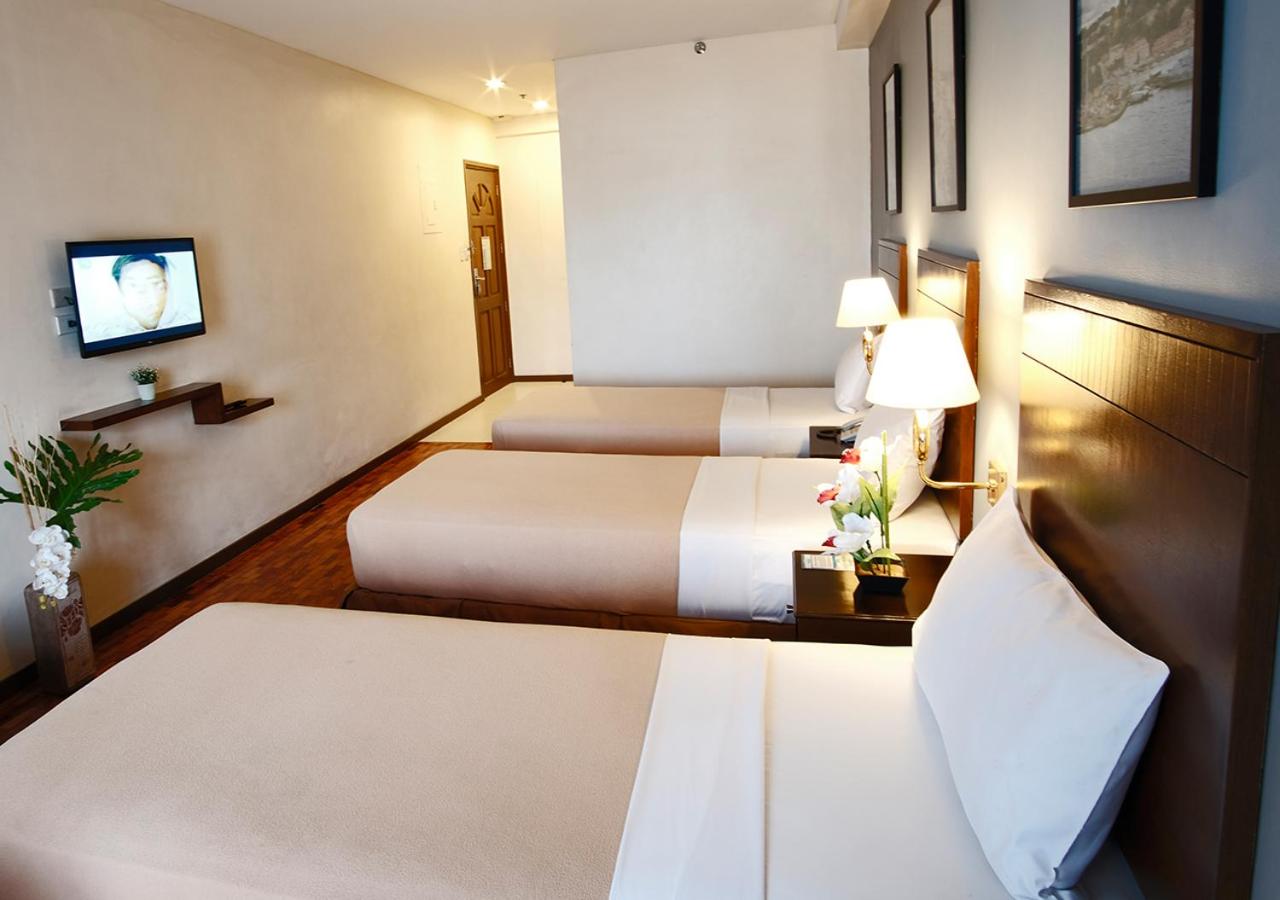 Deluxe Triple Room - Photo 7