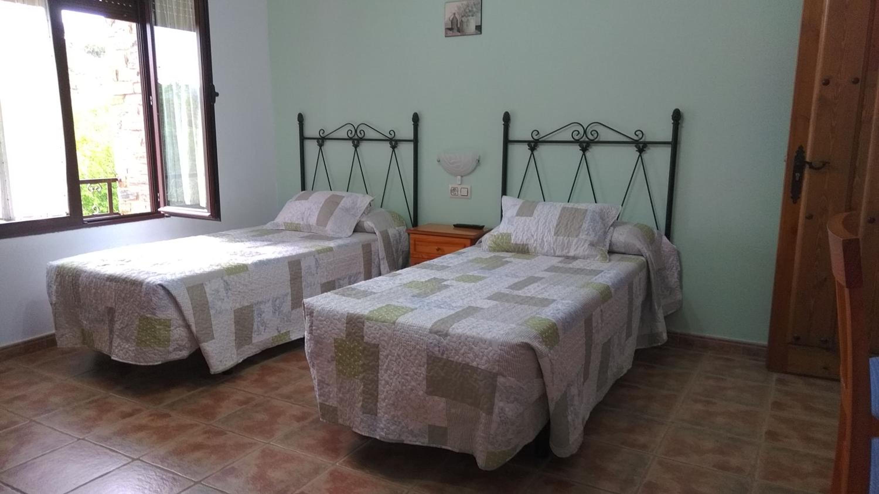 Habitación triple con ducha