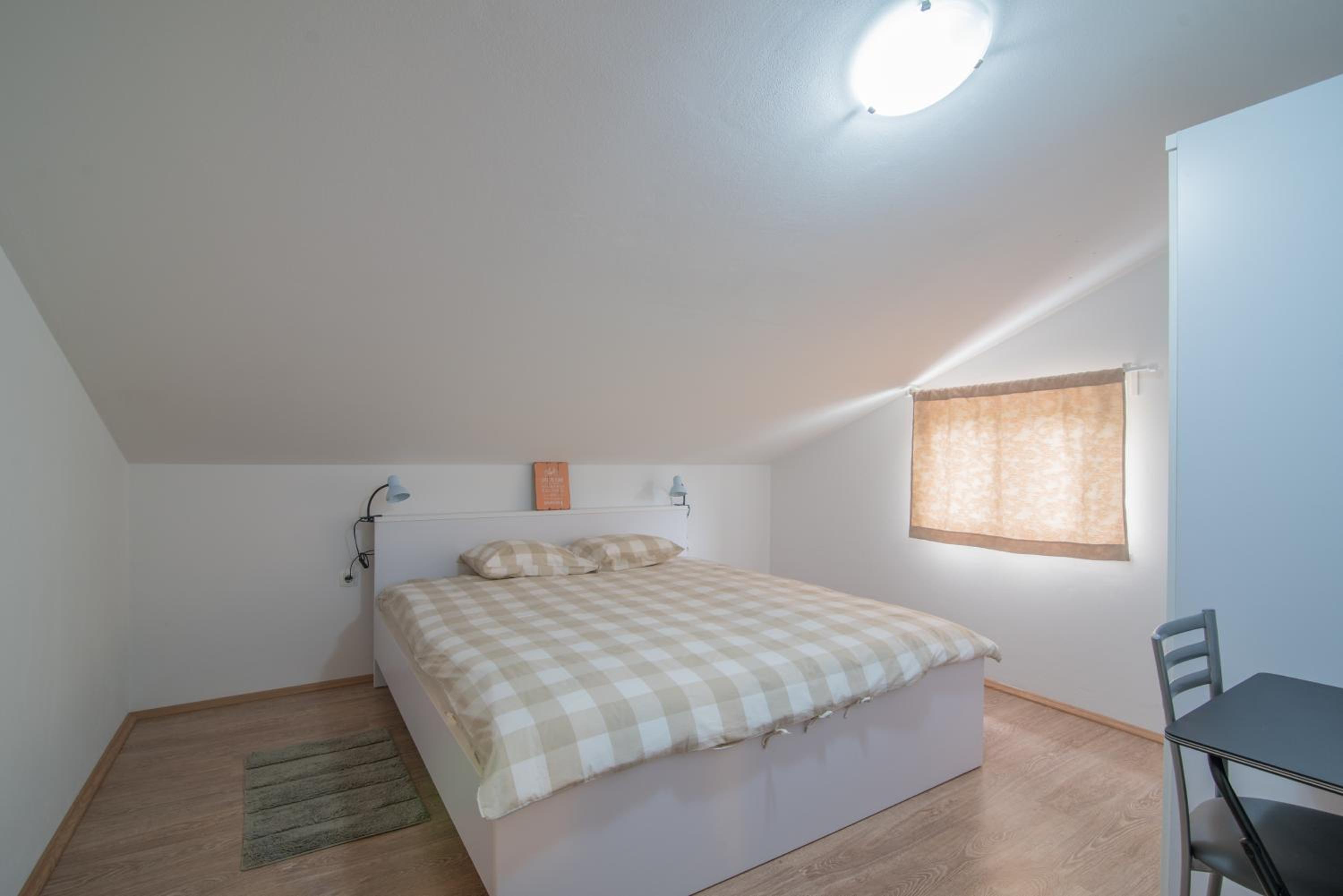 Two-Bedroom Apartment - Photo 11