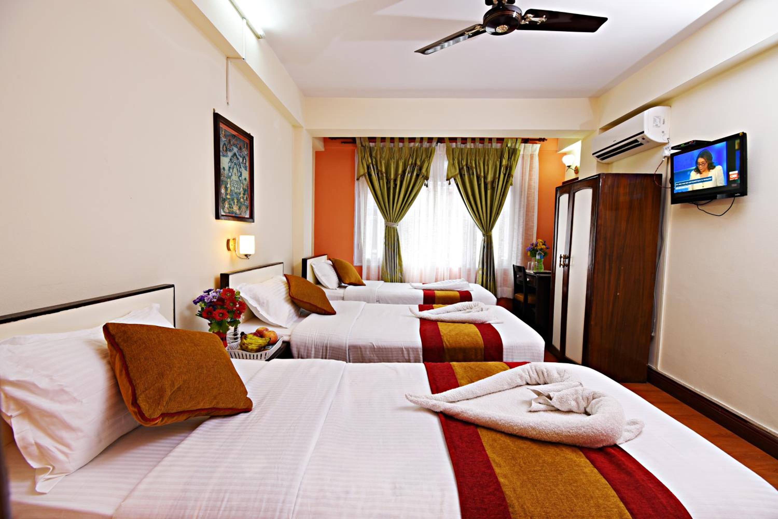 Deluxe Triple Room - Photo 8