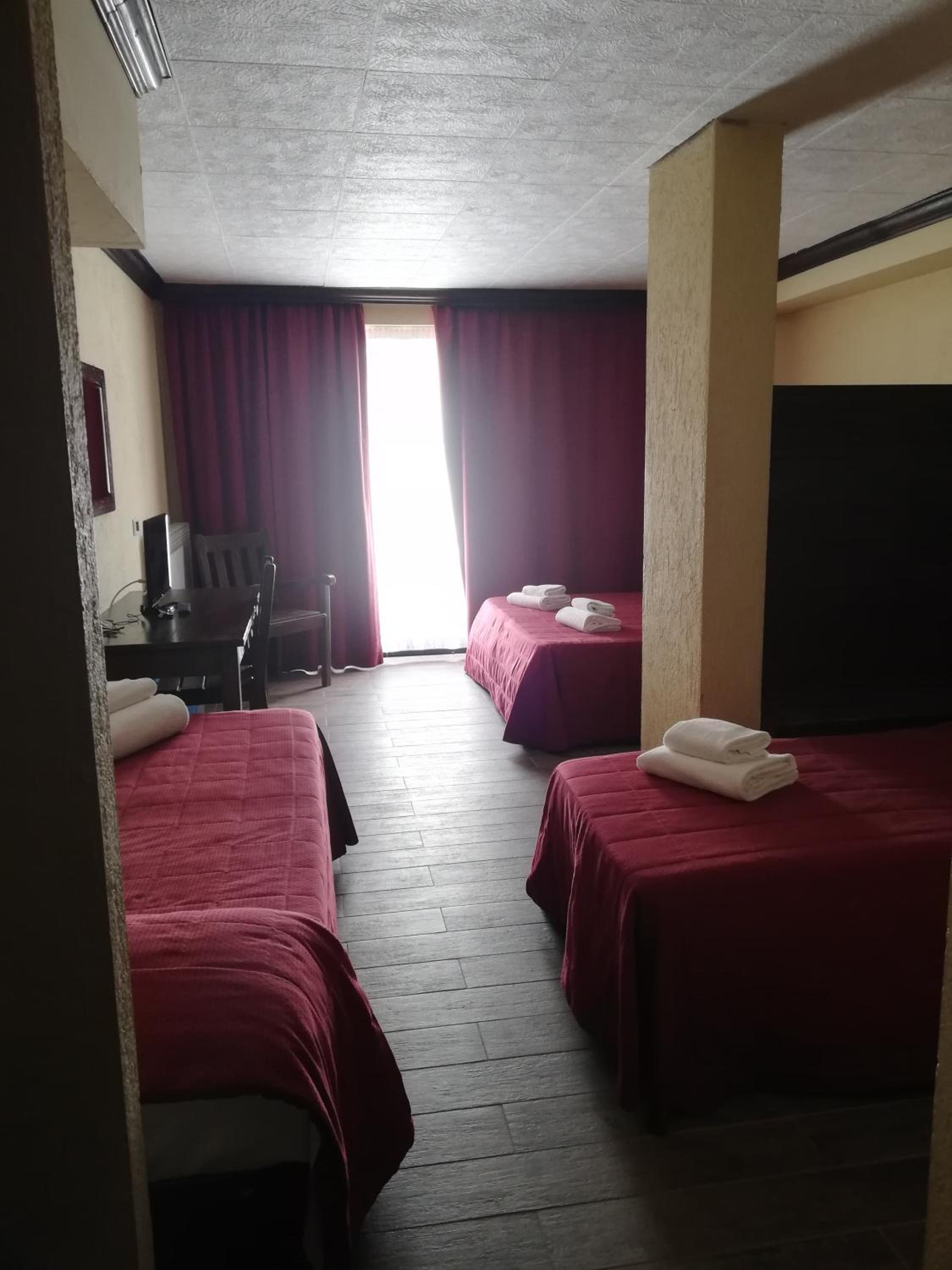 Quadruple Room - Photo 1