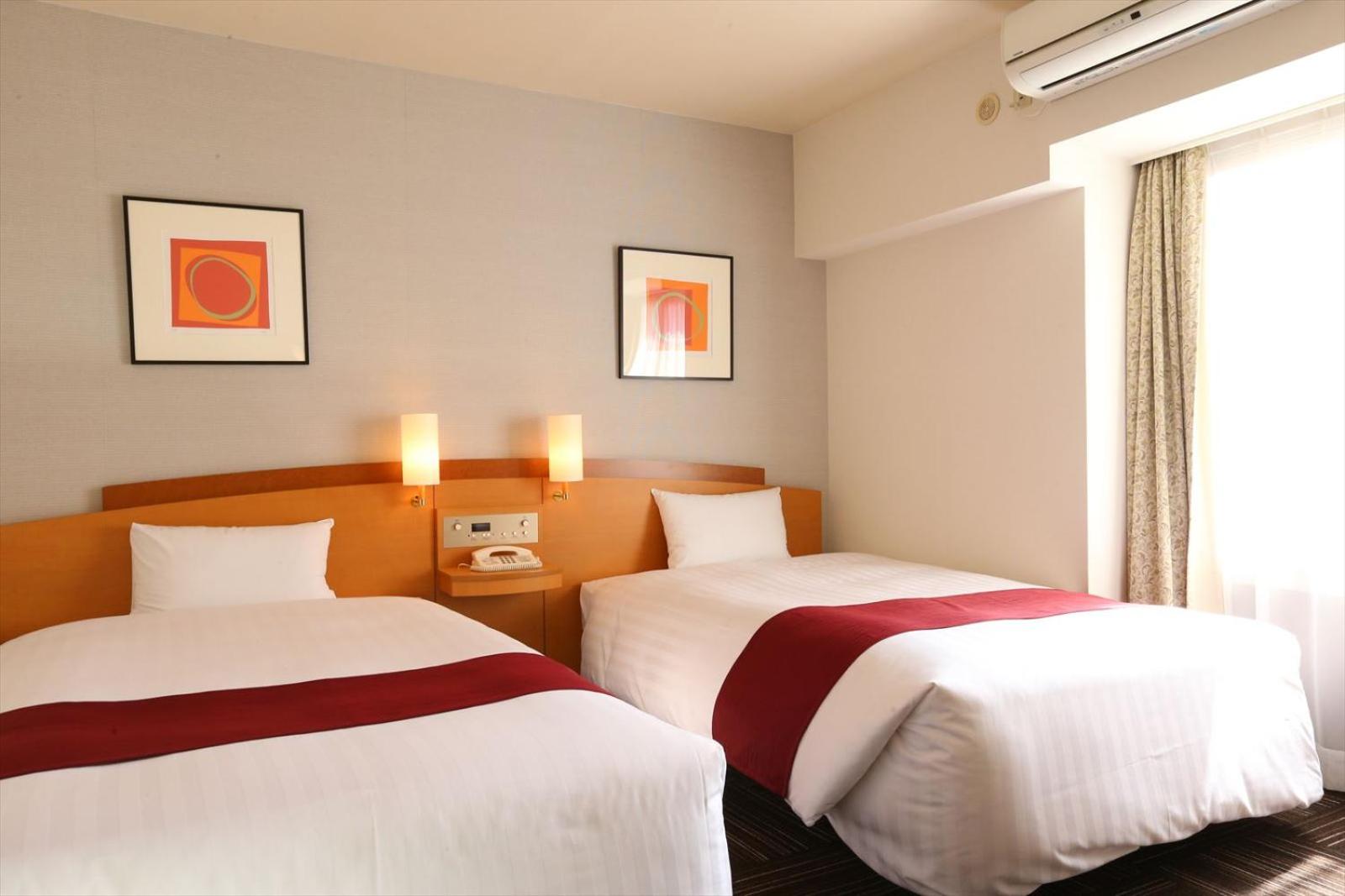 Twin Room - Non-Smoking photo 2