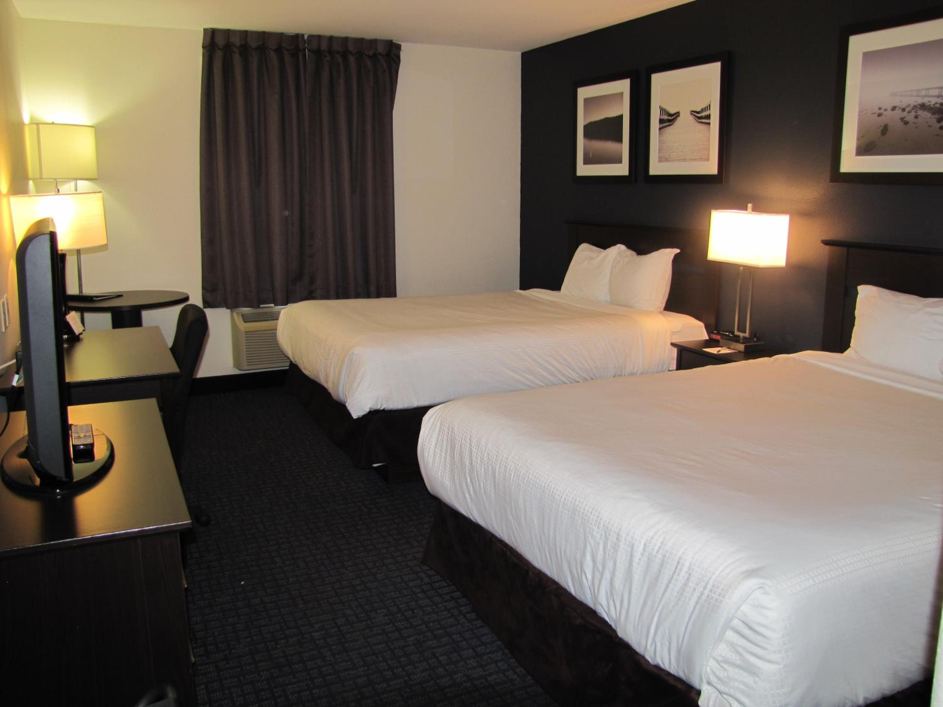 Deluxe Queen Suite with Two Queen Beds - Non-Smoking - Photo 1