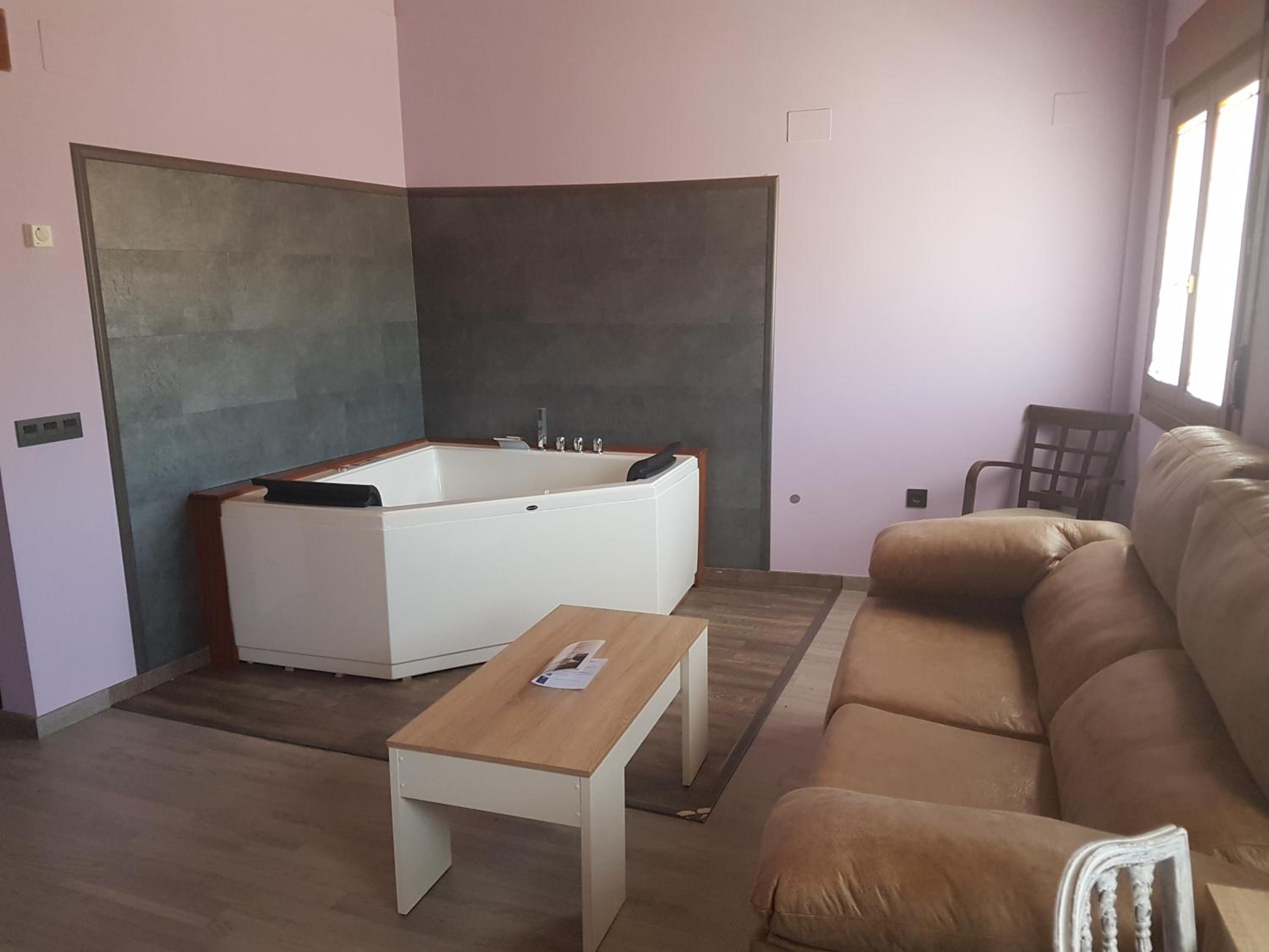 Habitación Cuádruple con Bañera de Hidromasaje