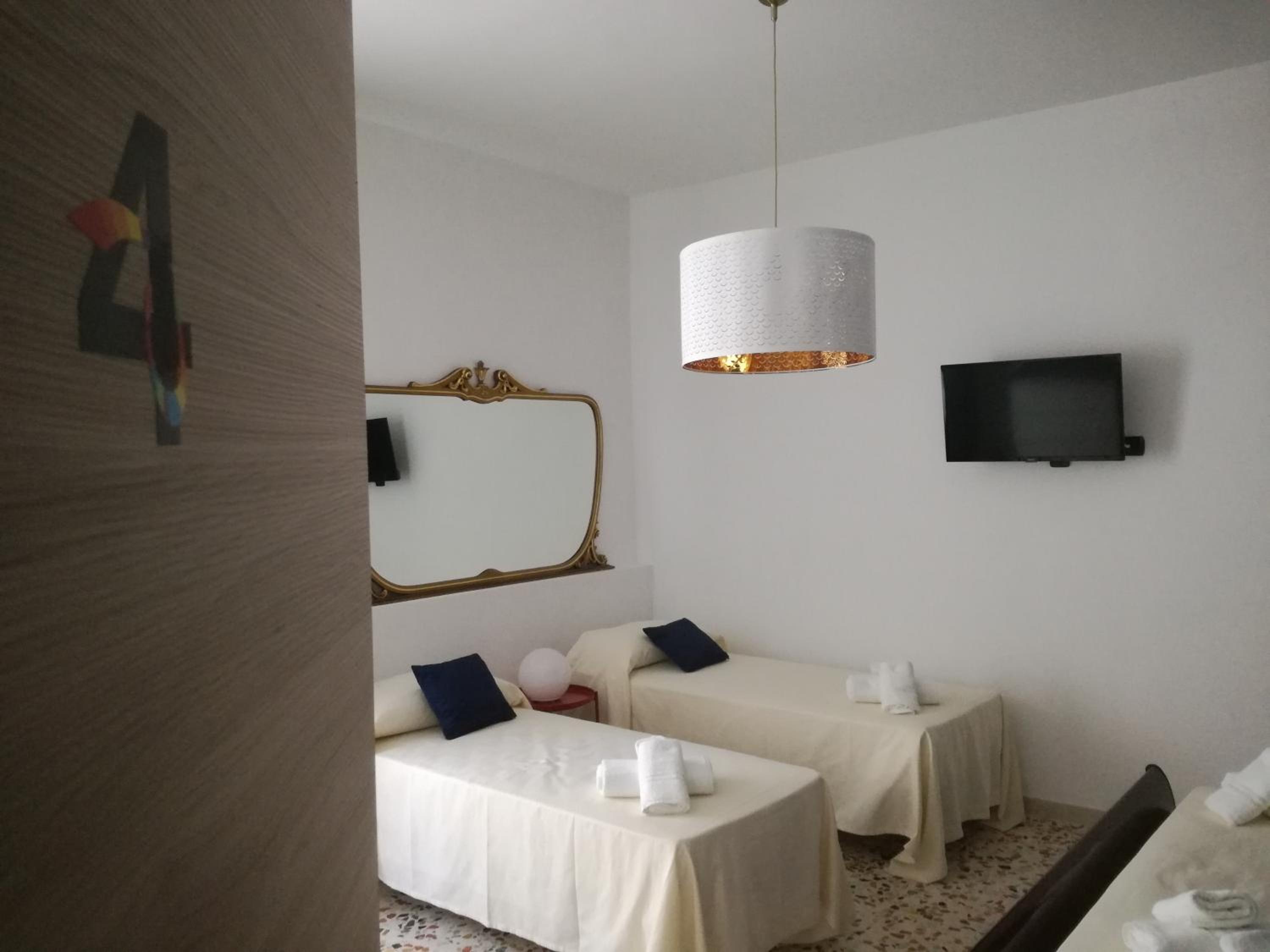 Economy Quadruple Room with Private External Bathroom