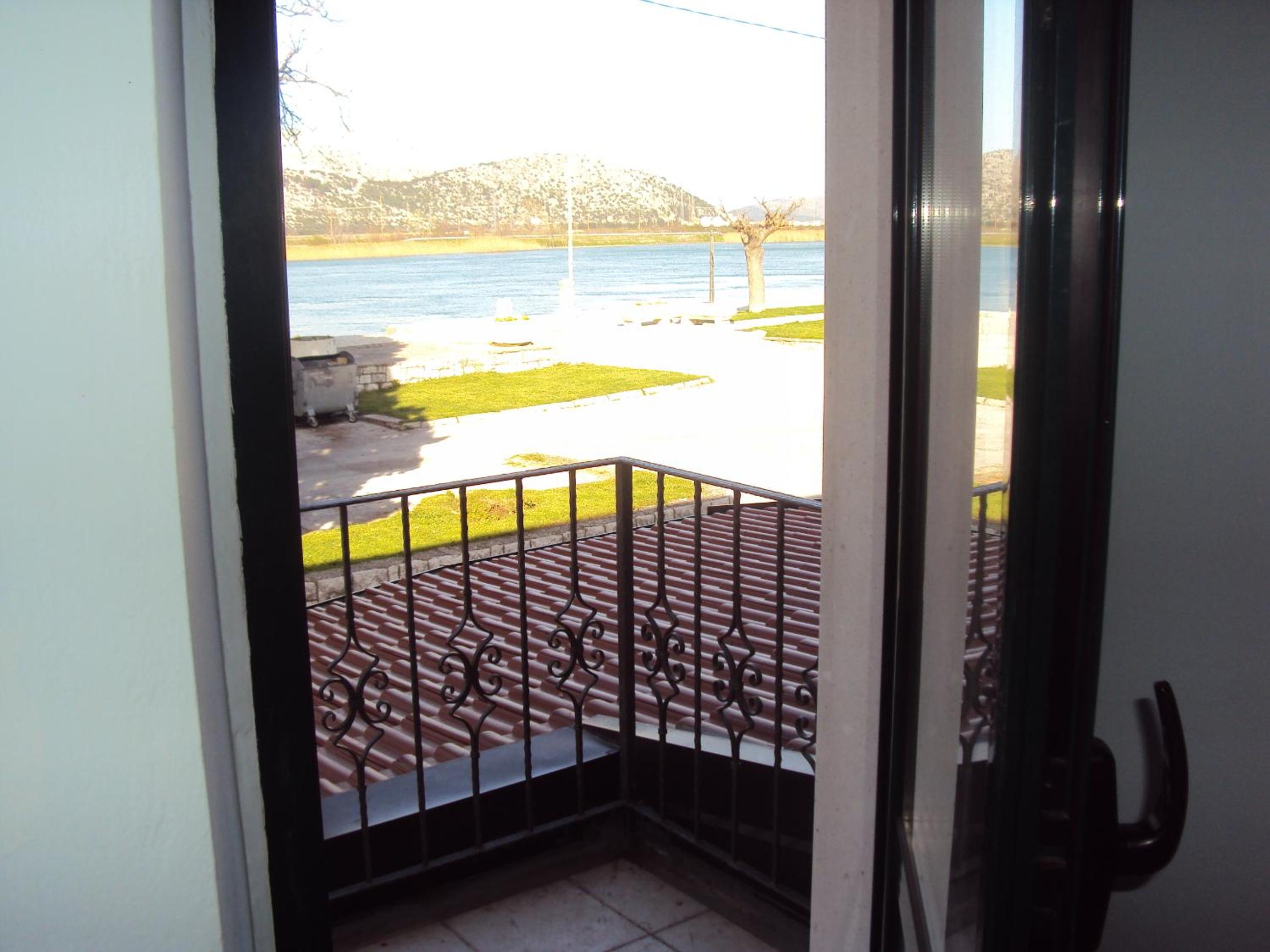 Apartment with Balcony - Photo 11