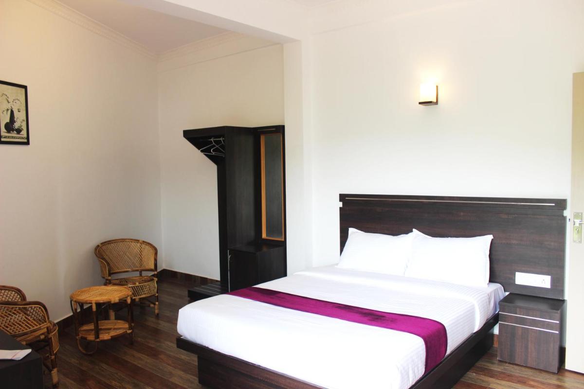 Queen Room with Balcony - Photo 1