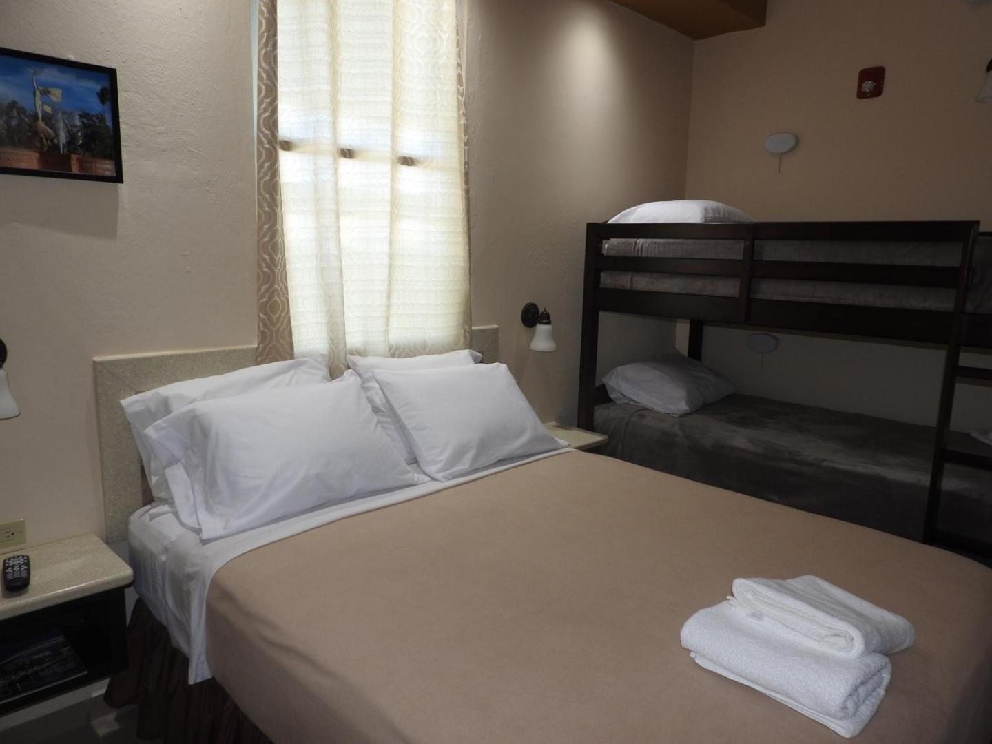 1 Queen and Bunk Beds Room