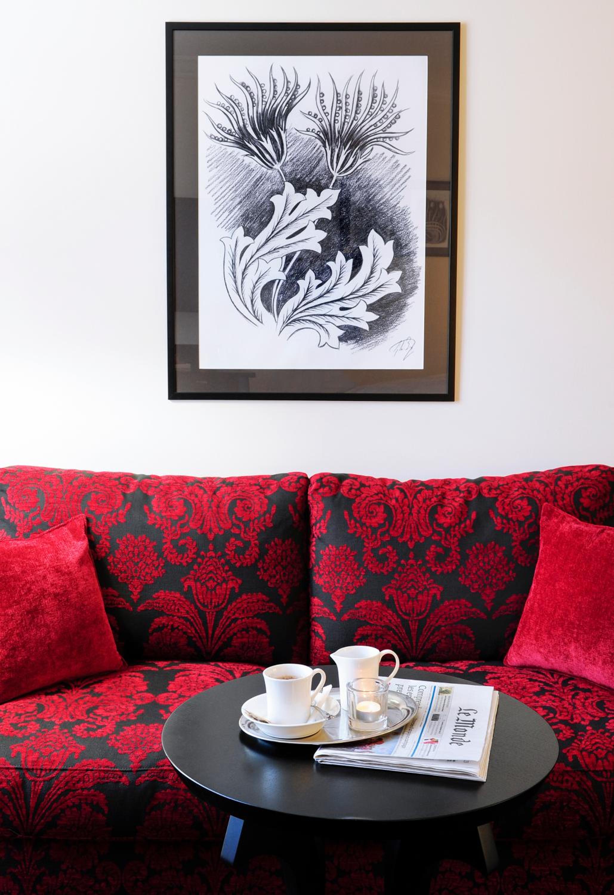 Enjoy coffee and elegant decor in this cozy dining space.