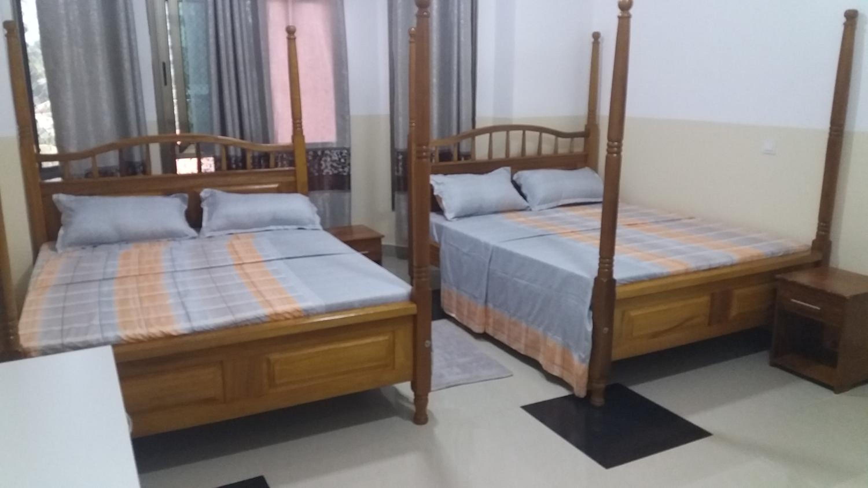 Deluxe Queen Room With Two Queen Beds photo 1