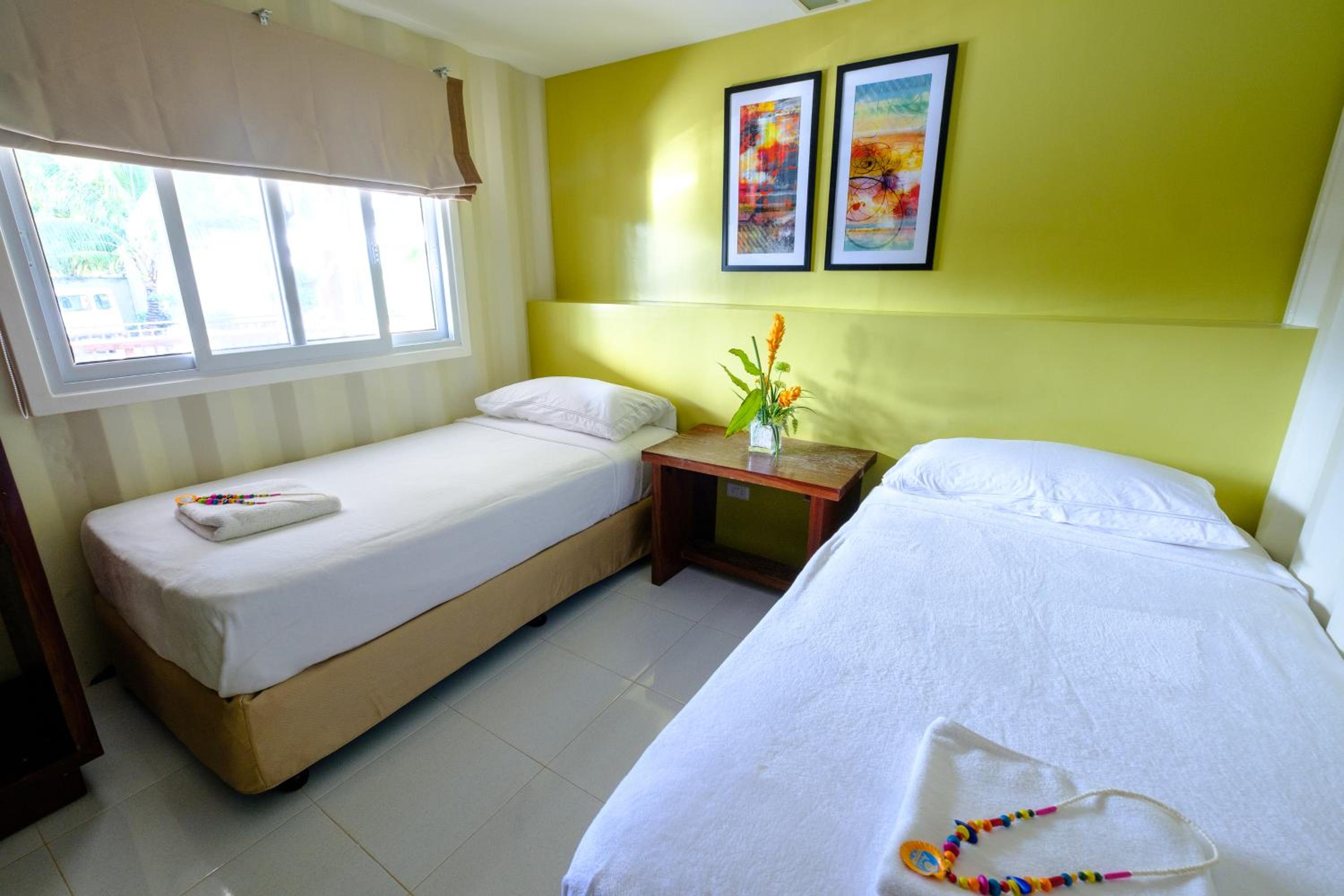 Sunset Twin Room with Pool View