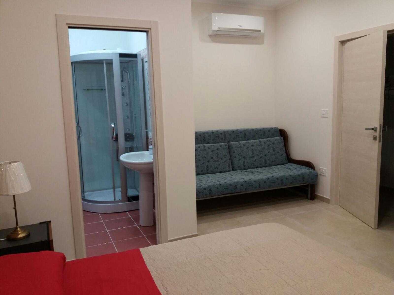 Deluxe Quadruple Room - Photo 6