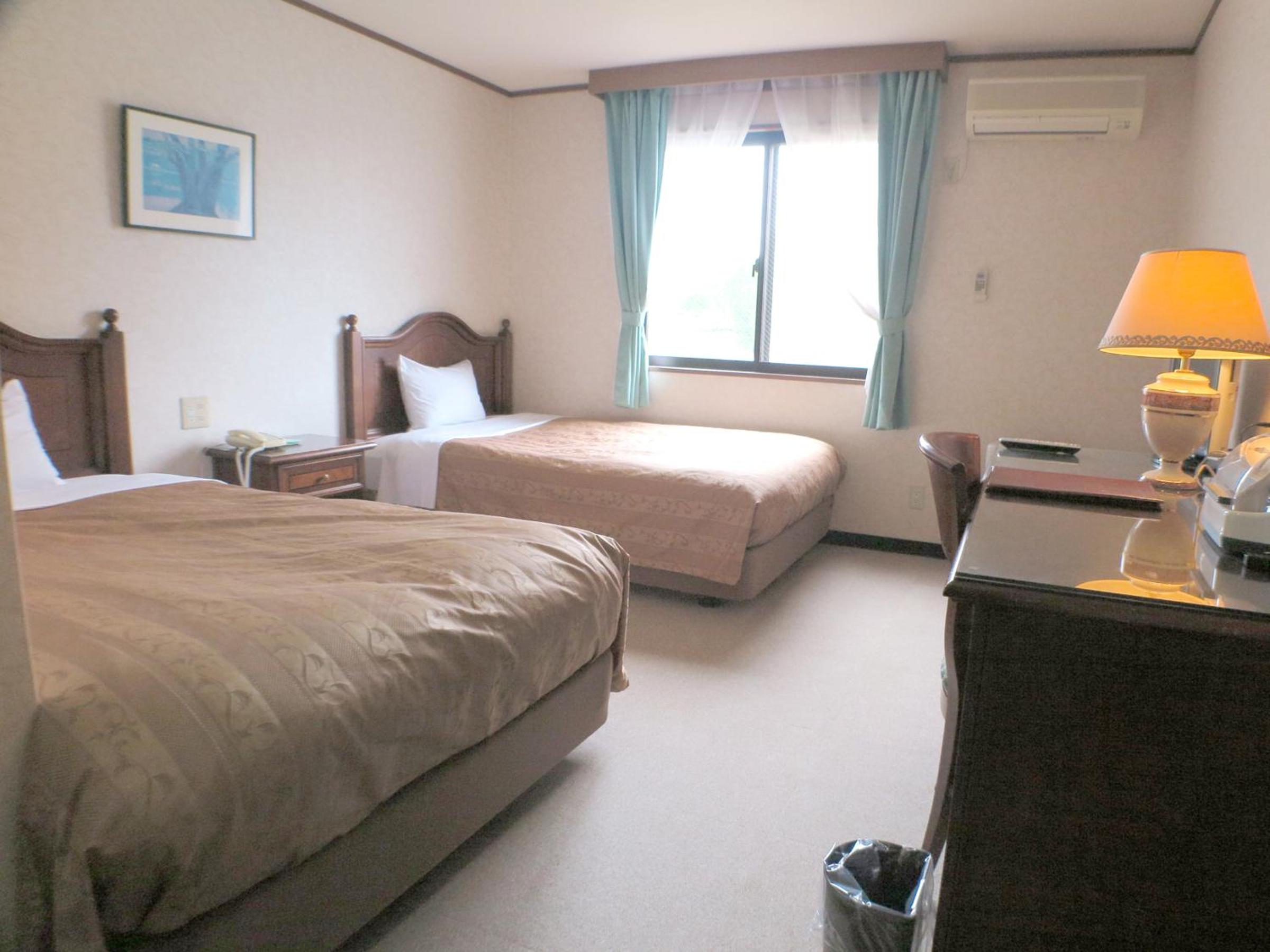 Twin Room - Photo 1