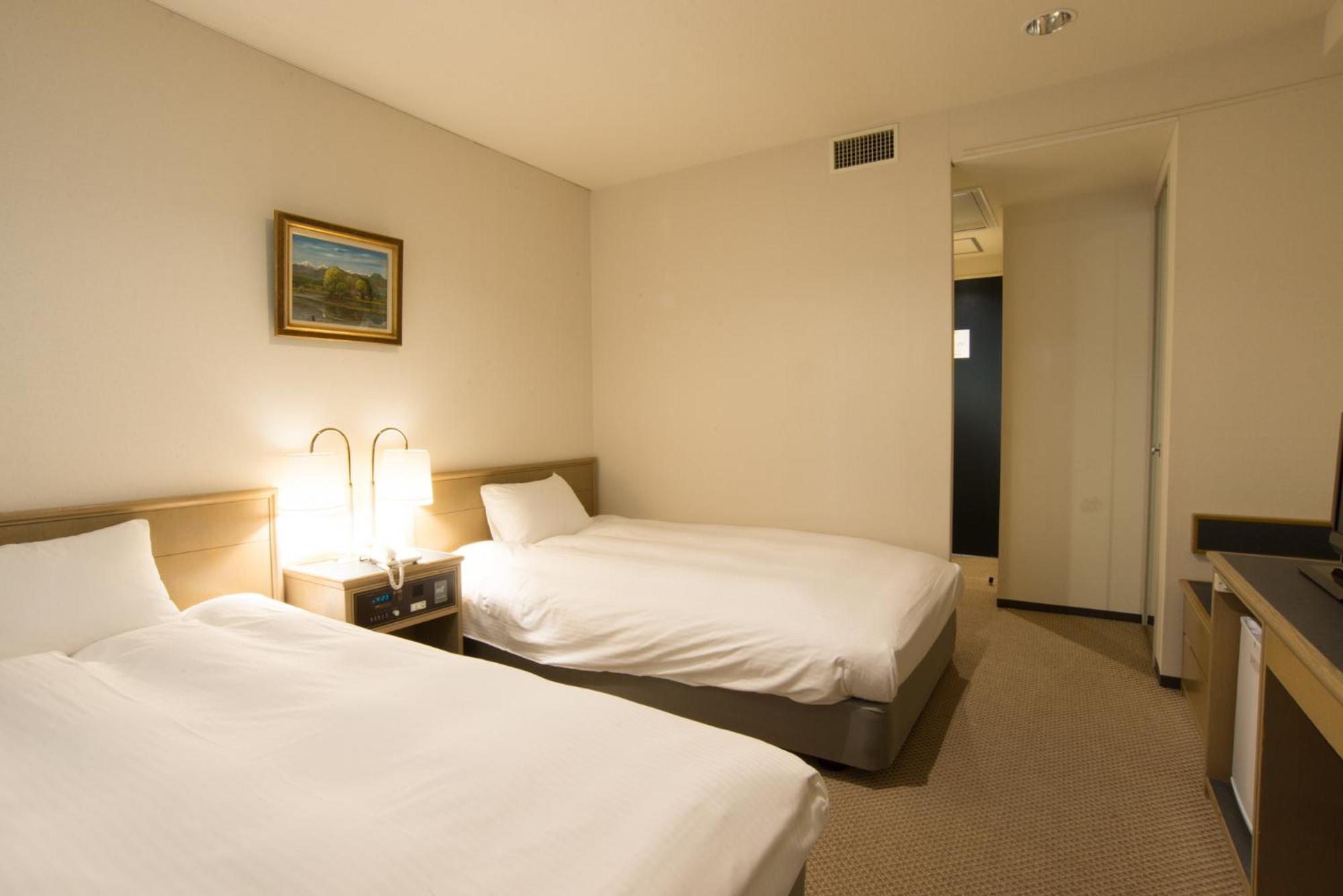 Twin Room - Photo 2