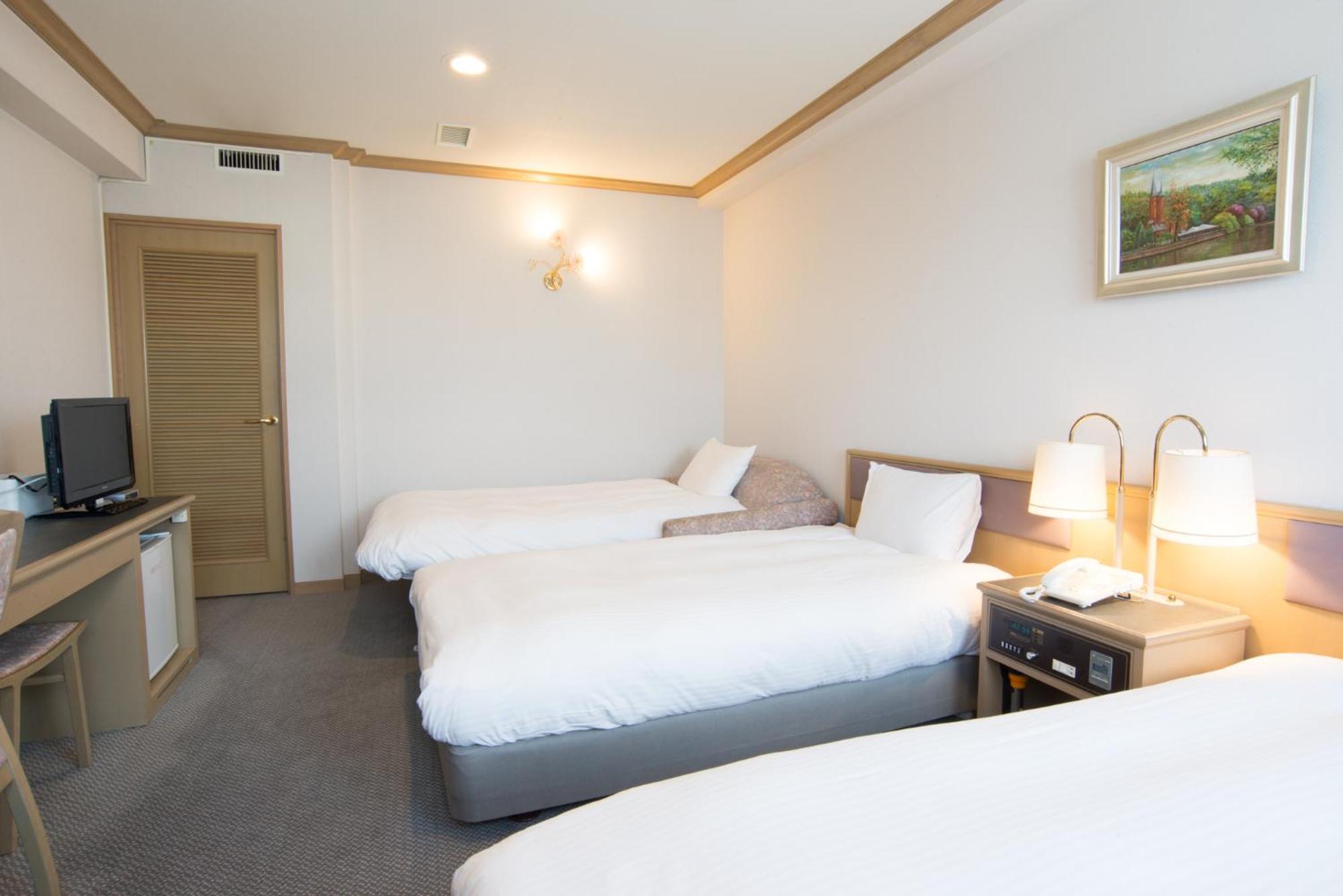 Triple Room - Photo 1