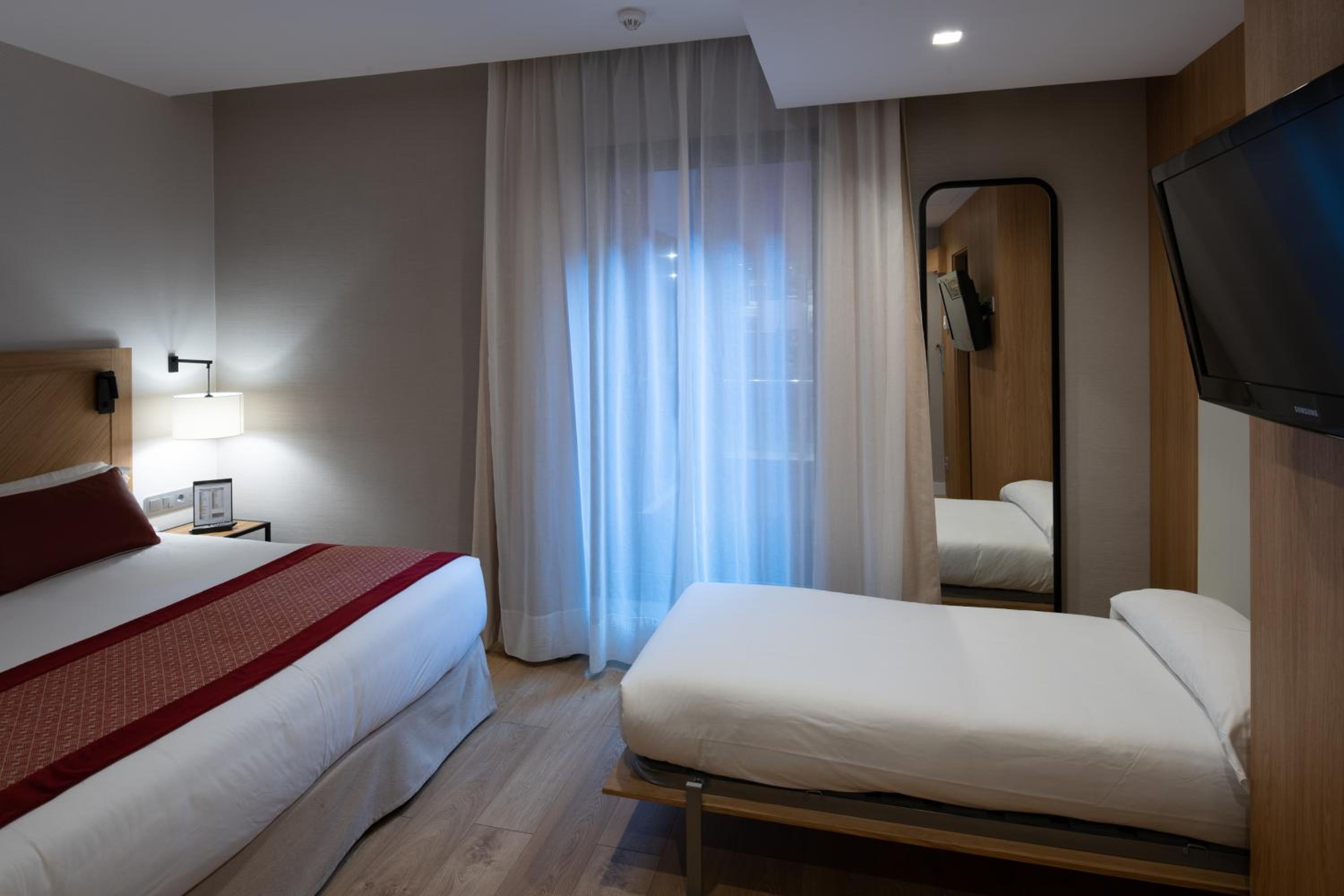 Triple Room (2 Adults + 1 Child)