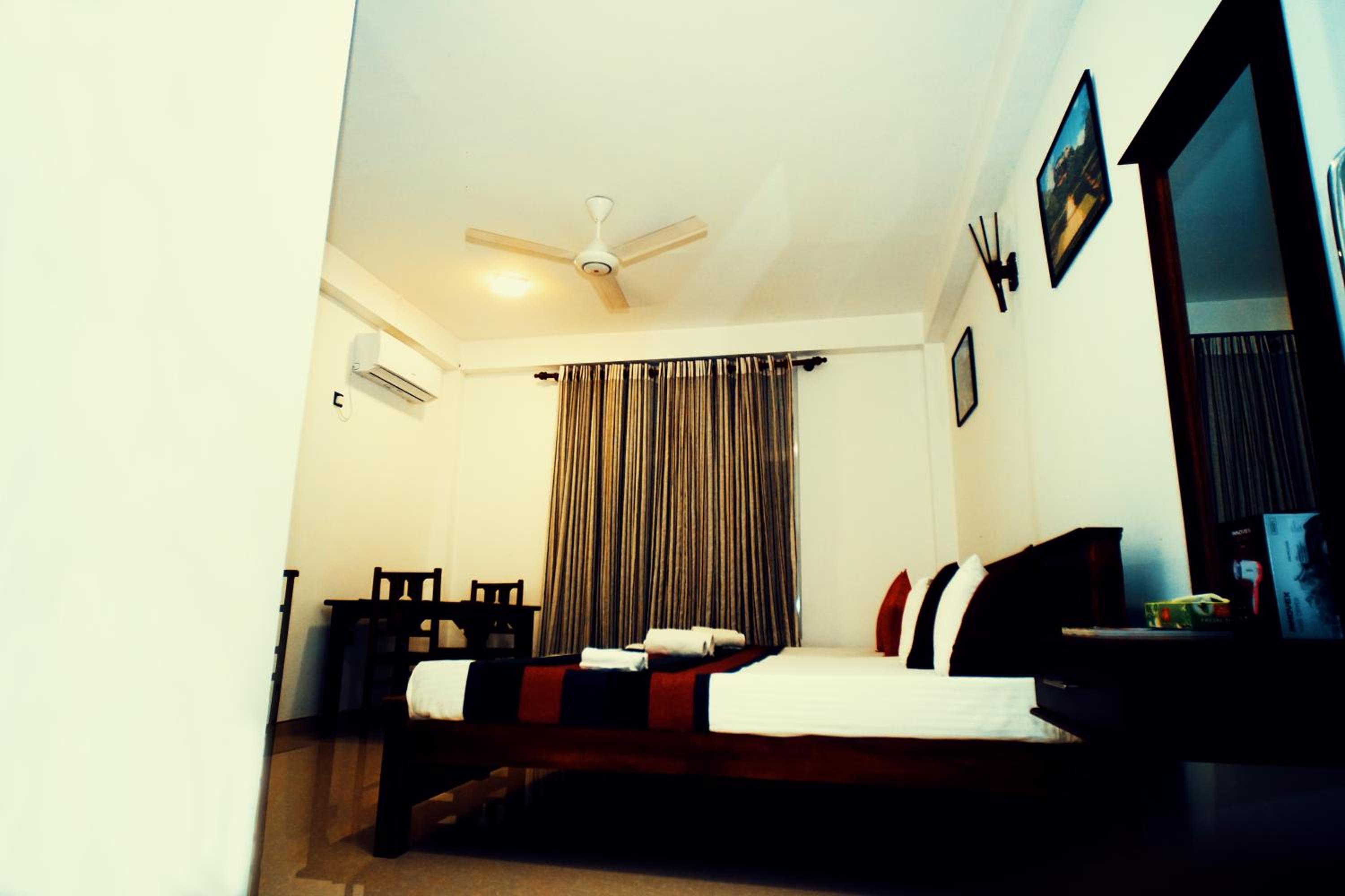 Deluxe Triple Room with Airport pickup & Drop photo 3