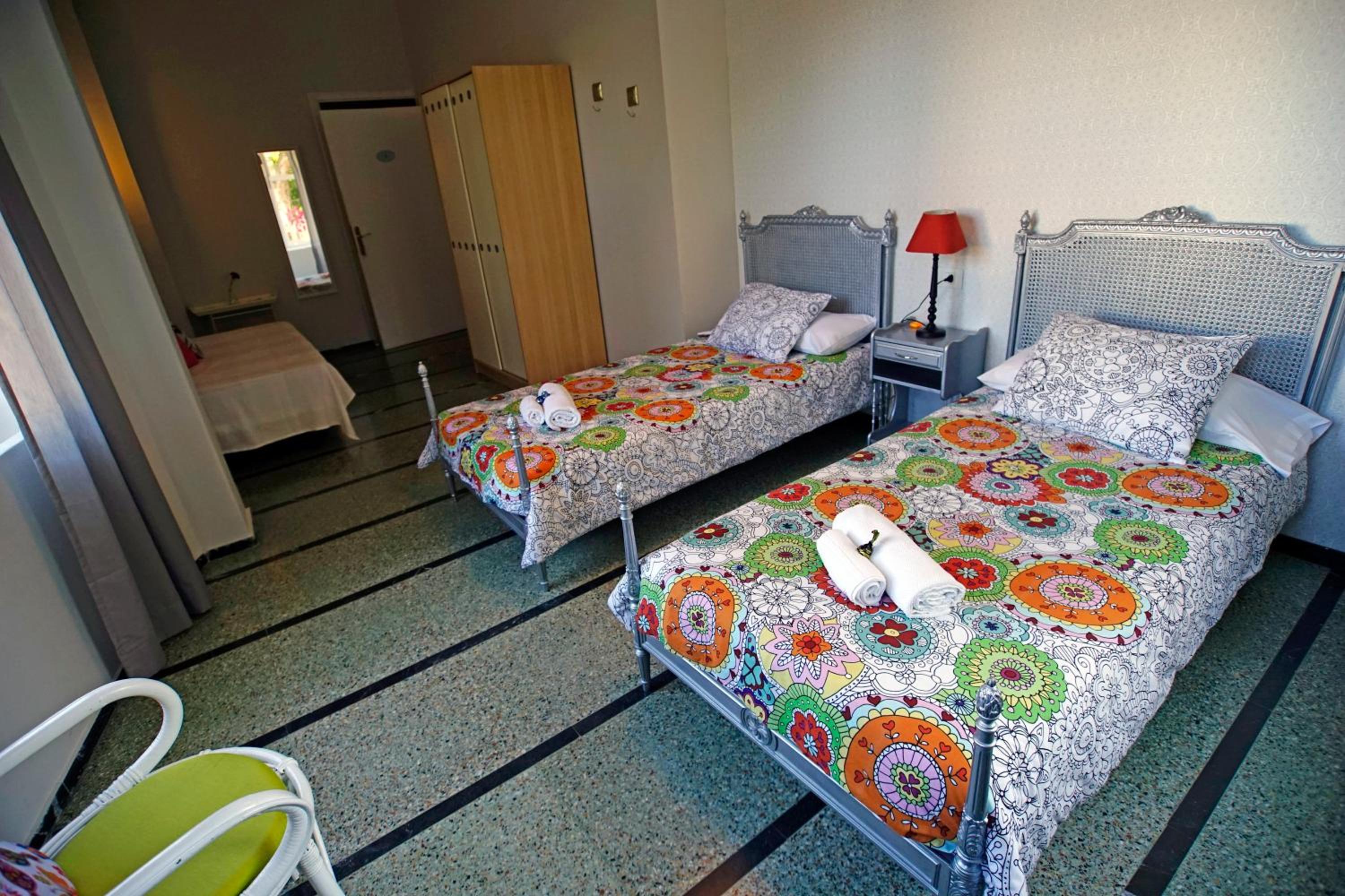 Habitación Triple Clásica con Baño Compartido