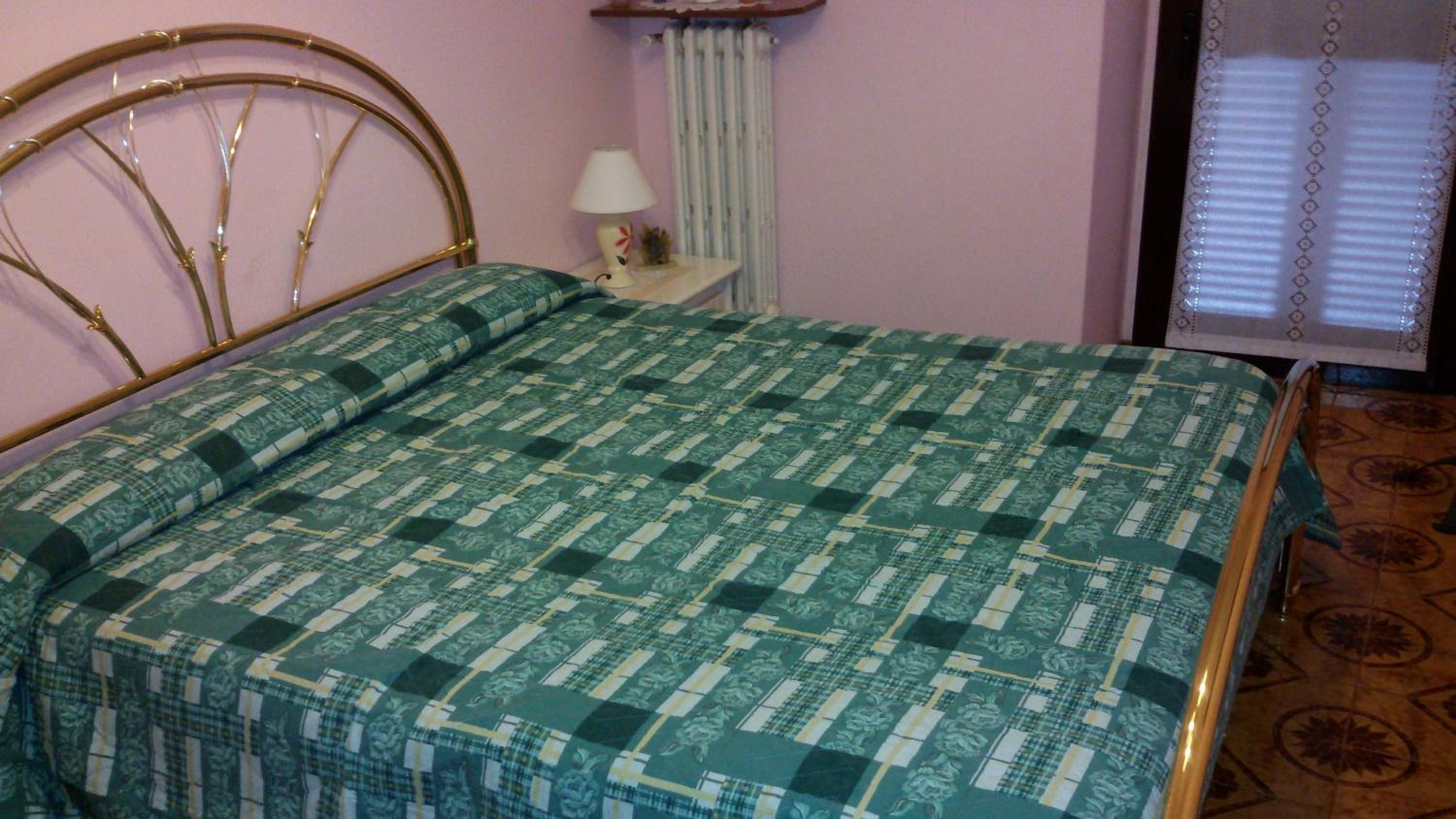 Quadruple Room with Private Bathroom