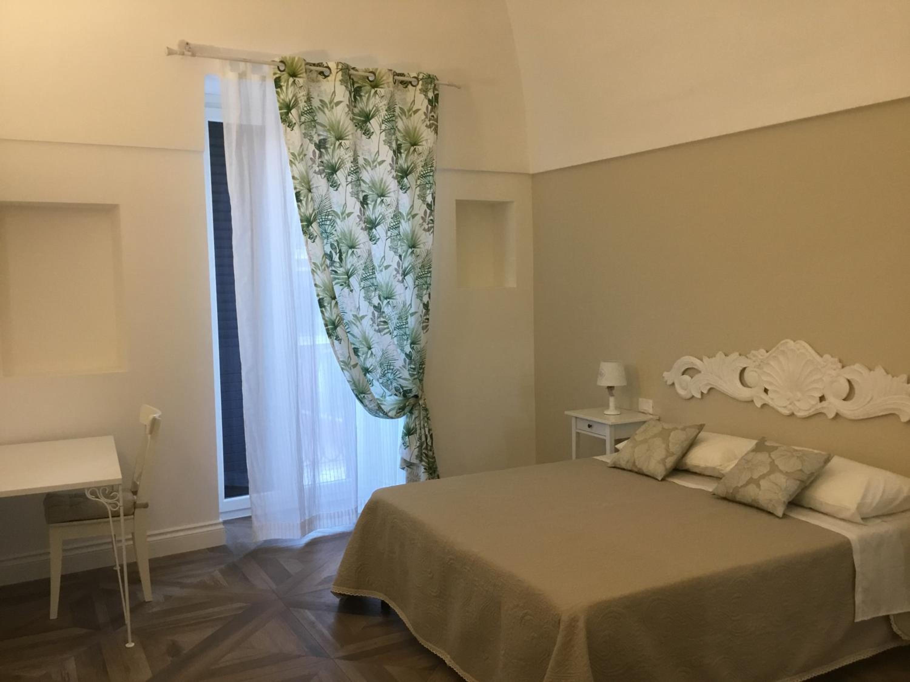 Quadruple Room with Private Bathroom photo 1