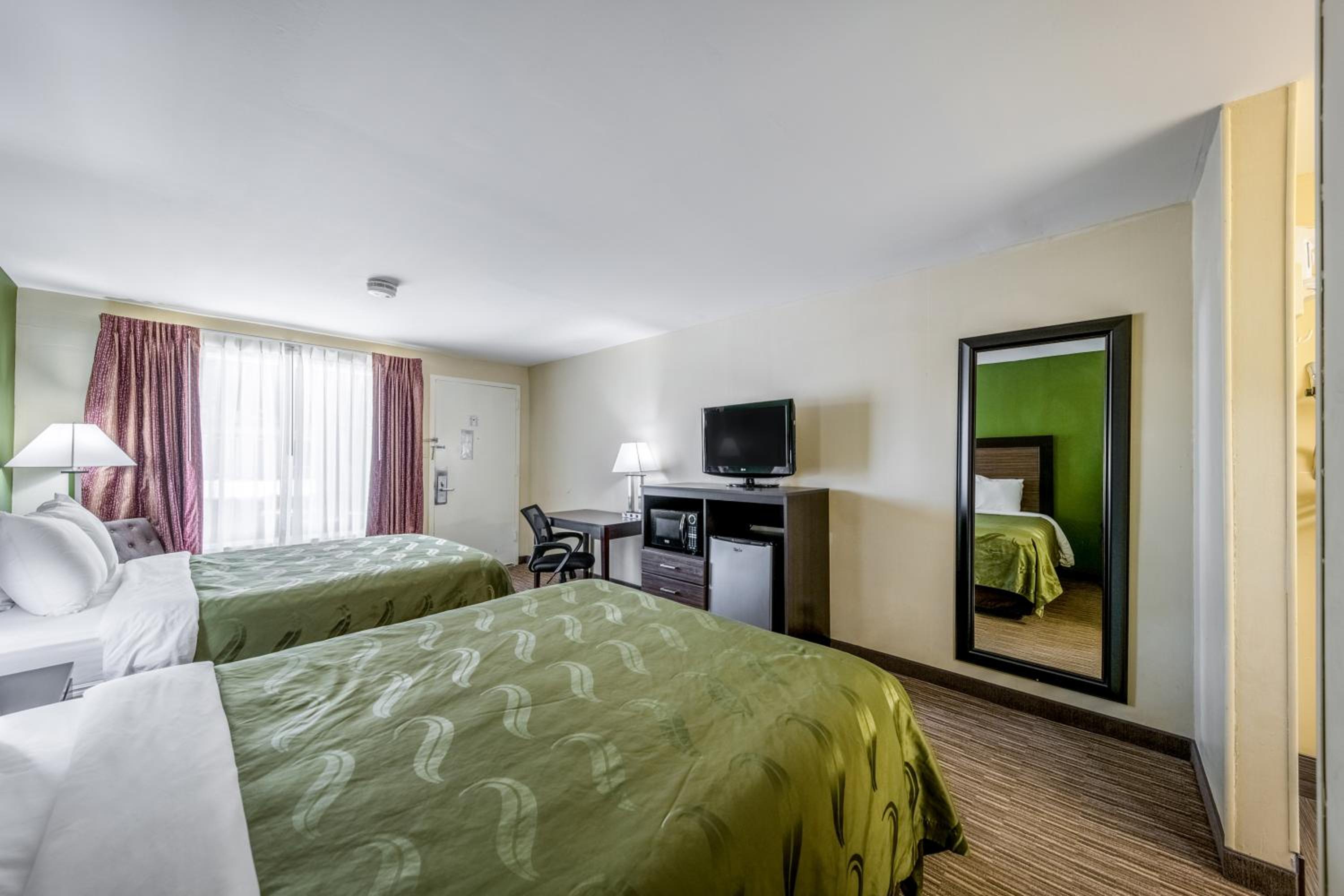 Queen Room with Two Queen Beds - Non-Smoking - Photo 1