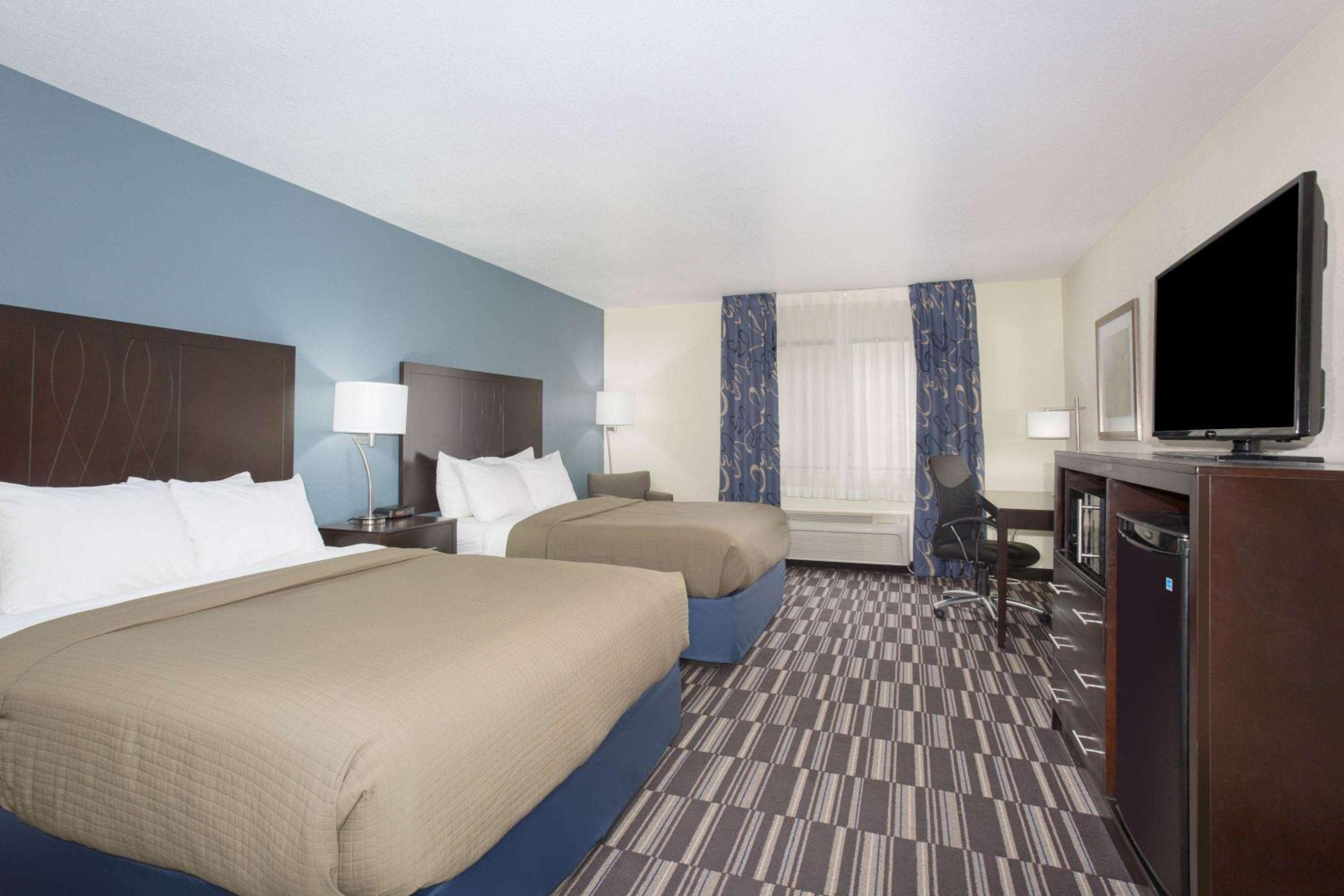 Queen Room with Two Queen Beds - Photo 1