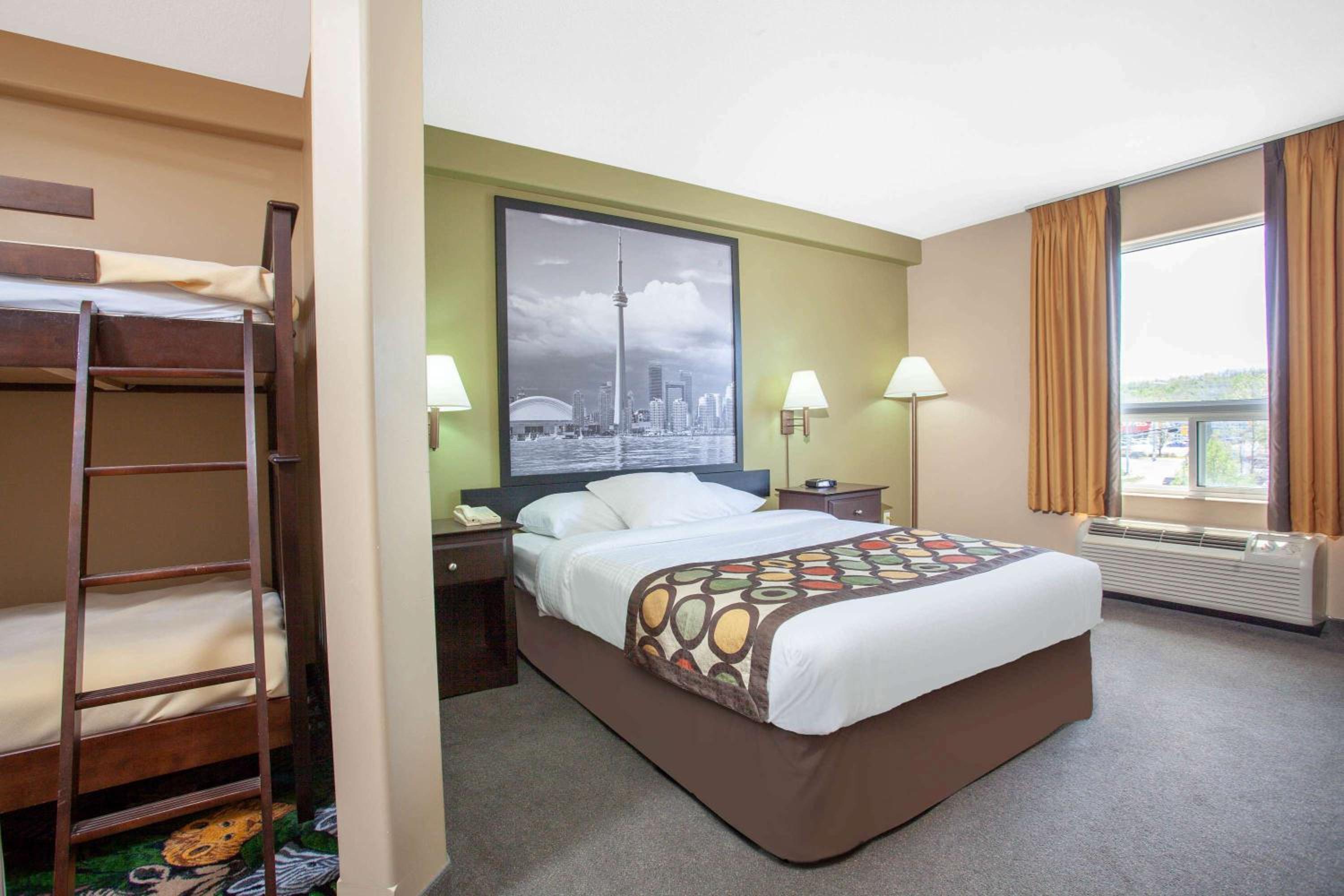 1 Queen Bed and 1 Bunk Bed, One-Bedroom, Suite, Non-Smoking - Photo 1