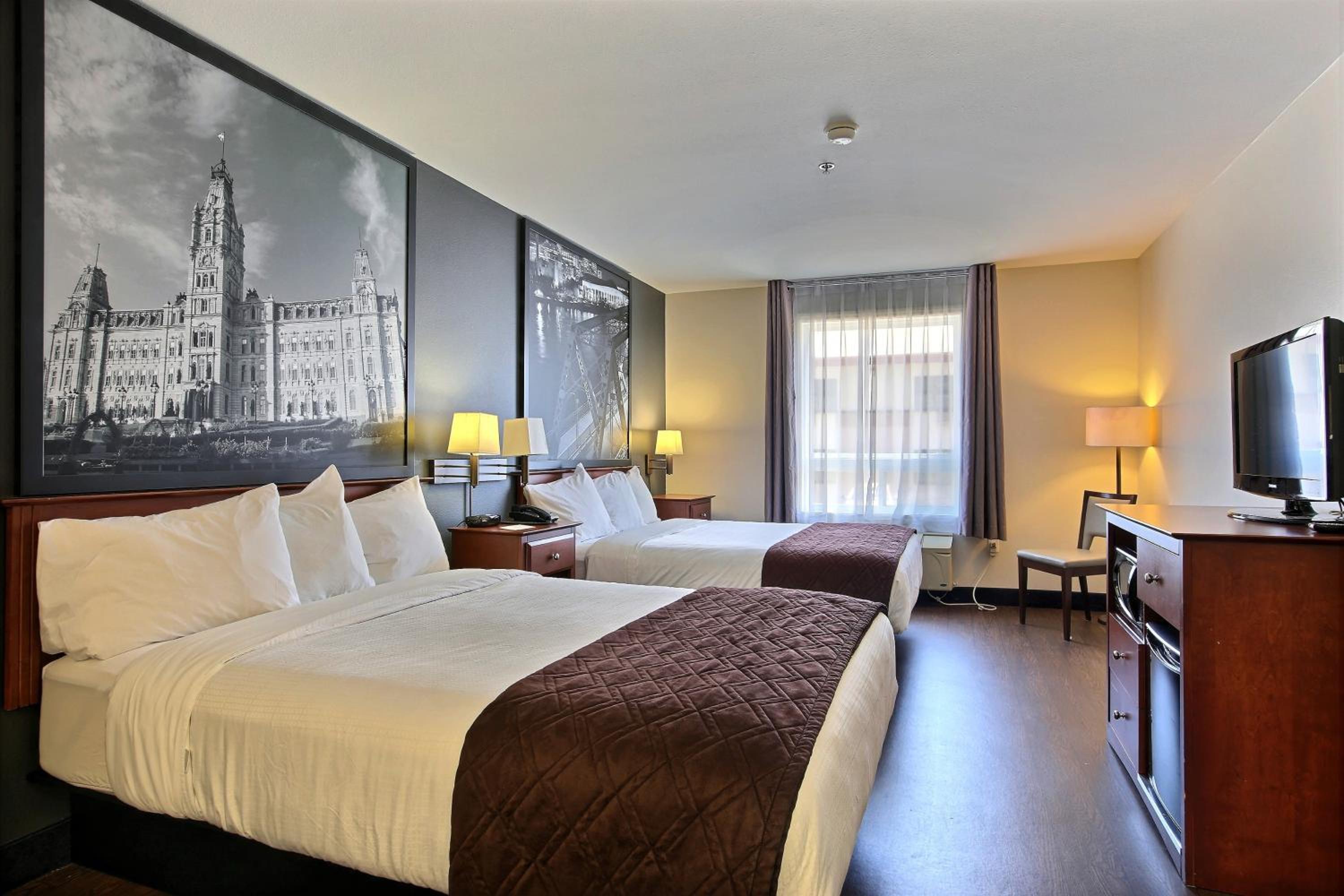 Deluxe Queen Suite with Two Queen Beds and Spa Bath - Non-Smoking - Photo 1