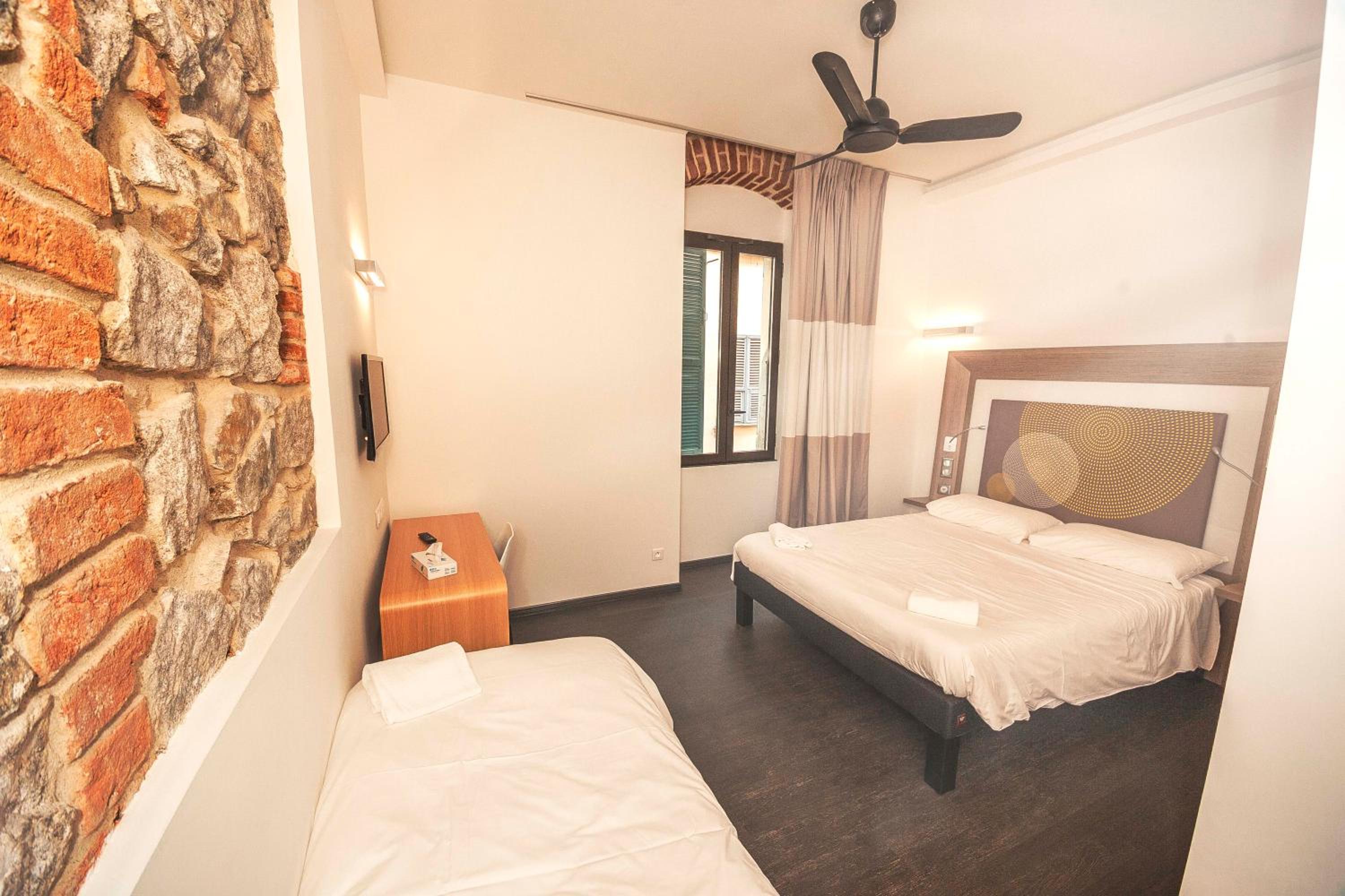 Triple Room (1 Double Bed + 1 Single Bed)