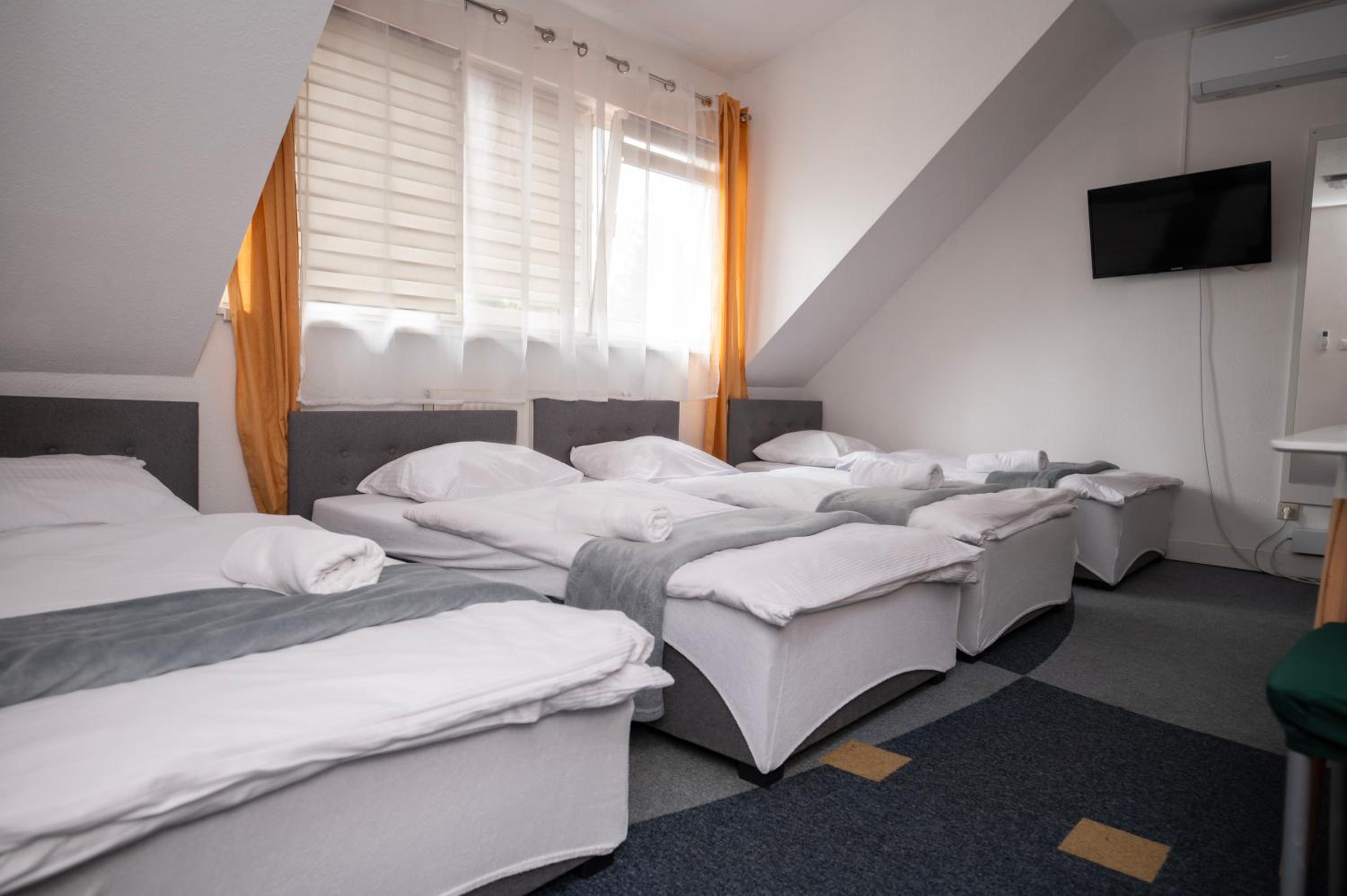Quadruple Room with Shared Bathroom