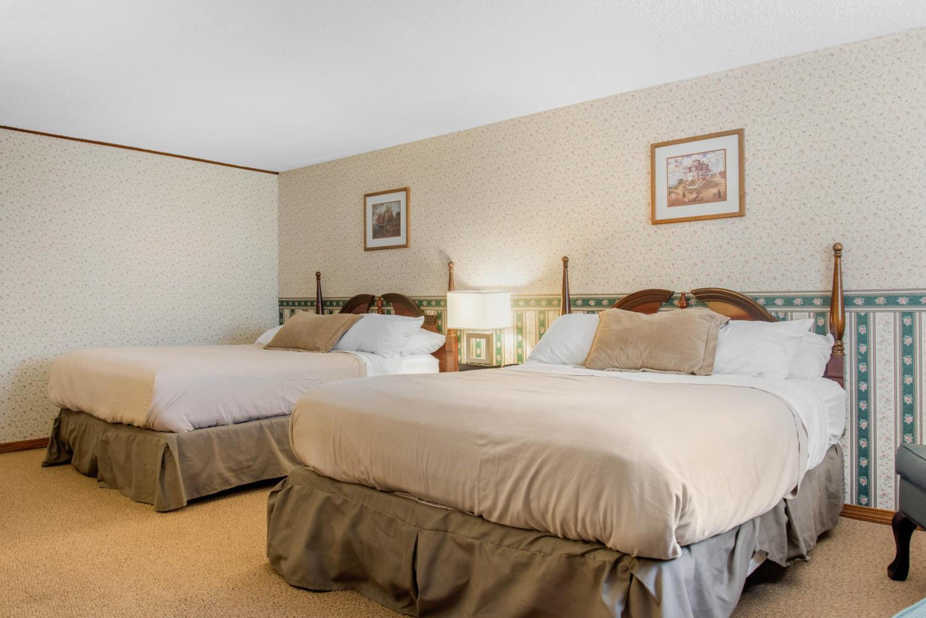 Queen Room with Two Queen Beds - Pet Friendly photo 1
