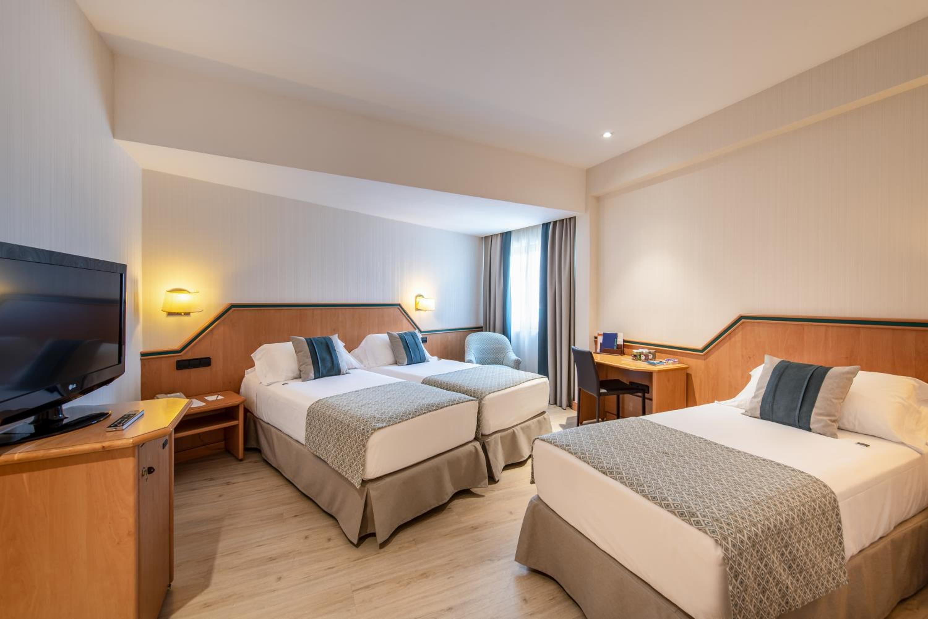 Triple Room - Photo 1