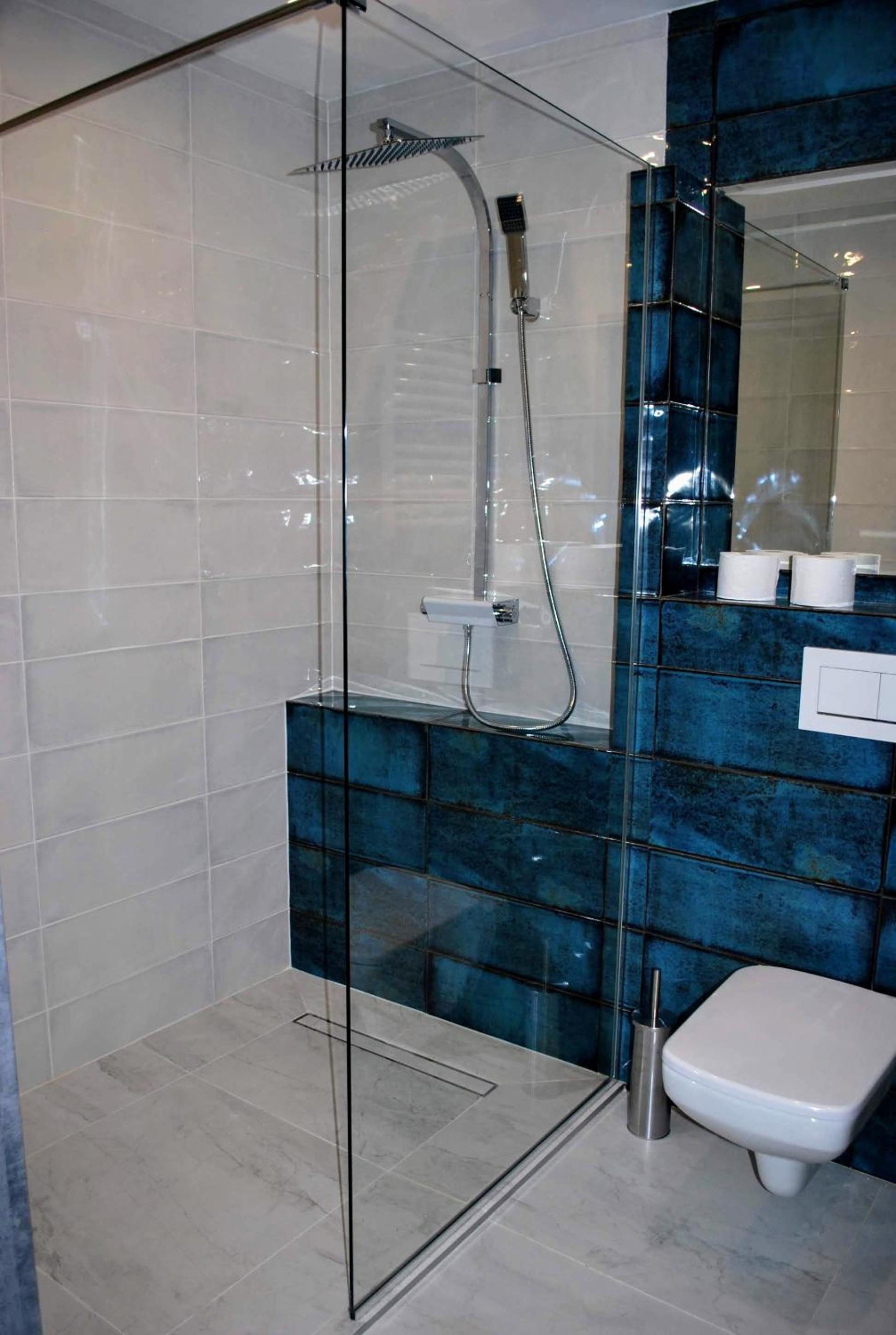 Deluxe Quadruple Room - Photo 13