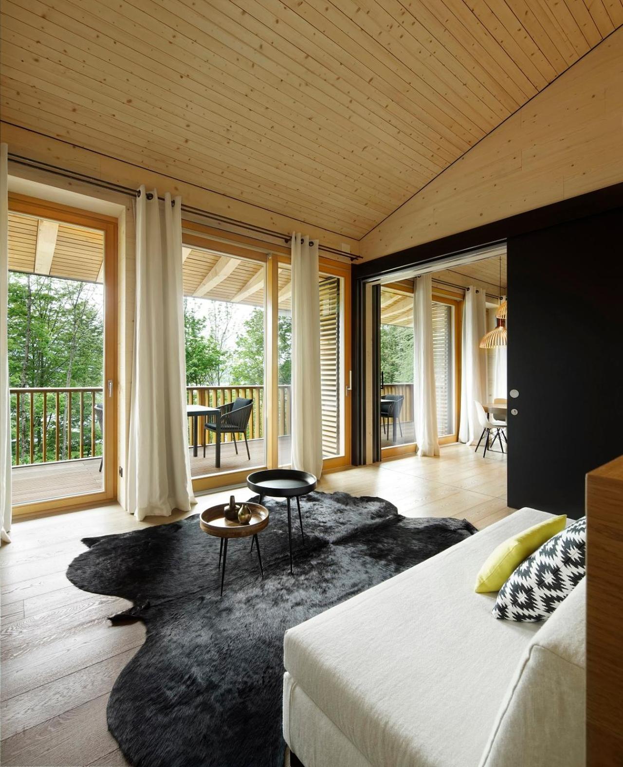 Apartment mit Seeblick – Gebäude AlpenChalet photo