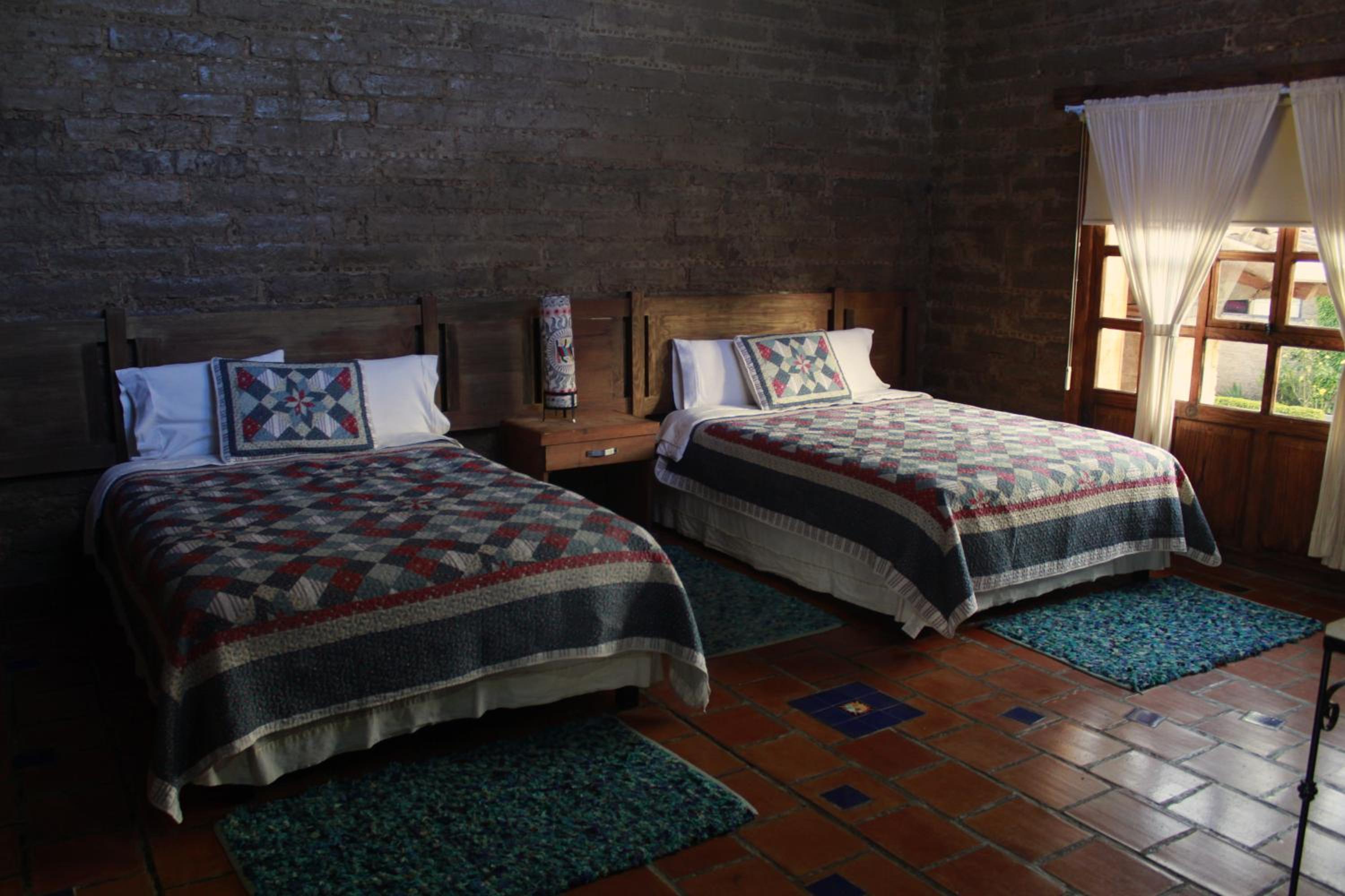 Deluxe Queen Room with Two Queen Beds photo 2