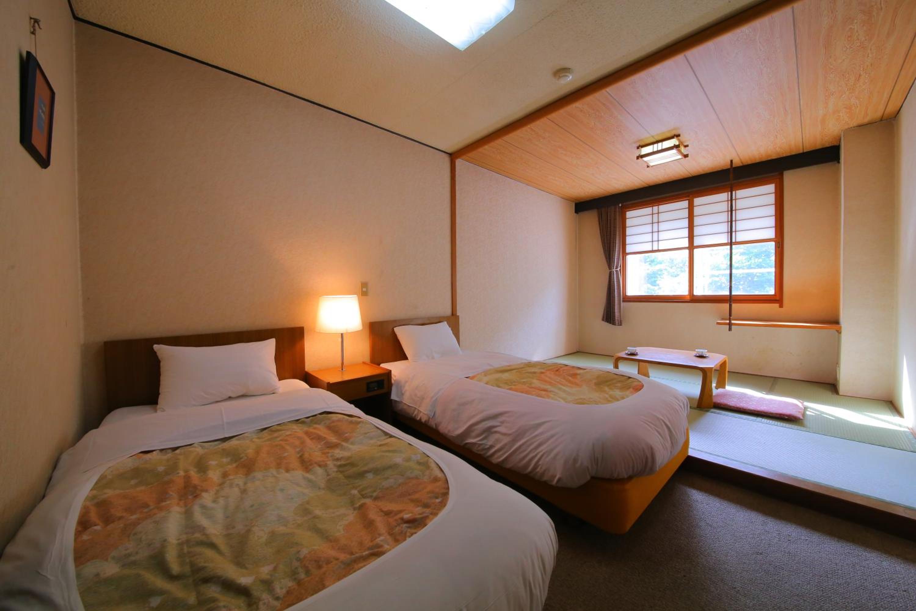 Twin Room - Photo 1
